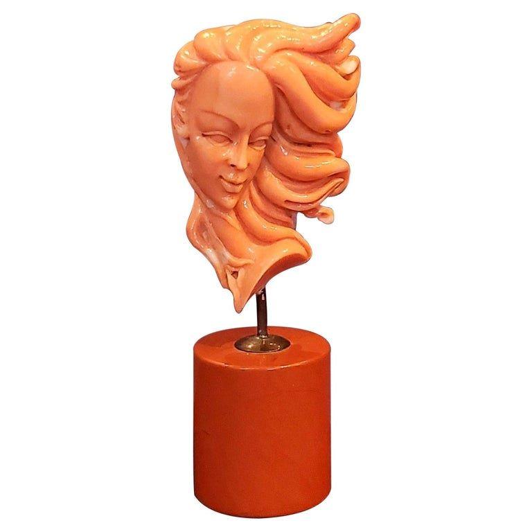 Chinese carved coral figure of a woman's face

Very finely hand-carved. 

Late 20th Century, China

Weight: 182 grams with base

Dimensions: approximately 4.63 x 1.75 inches.