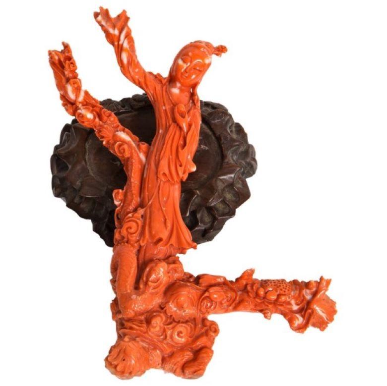 Chinese Gwandian carved coral sculpture Guanyin and Dragon
Very finely hand-carved. 

Circa Late 20th century, China

Weight:
With stand: 360.6 grams
Without stand: 280.7 grams

Dimensions: Approximately 7.44 x 6.50 inches.