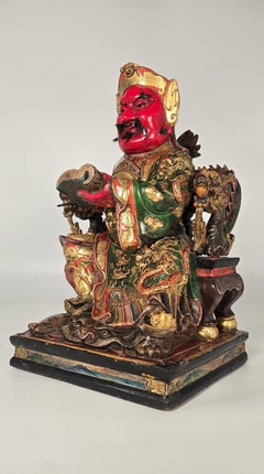 Chinese hand carved lacquered and hand painted figure of a scholar circa 1920