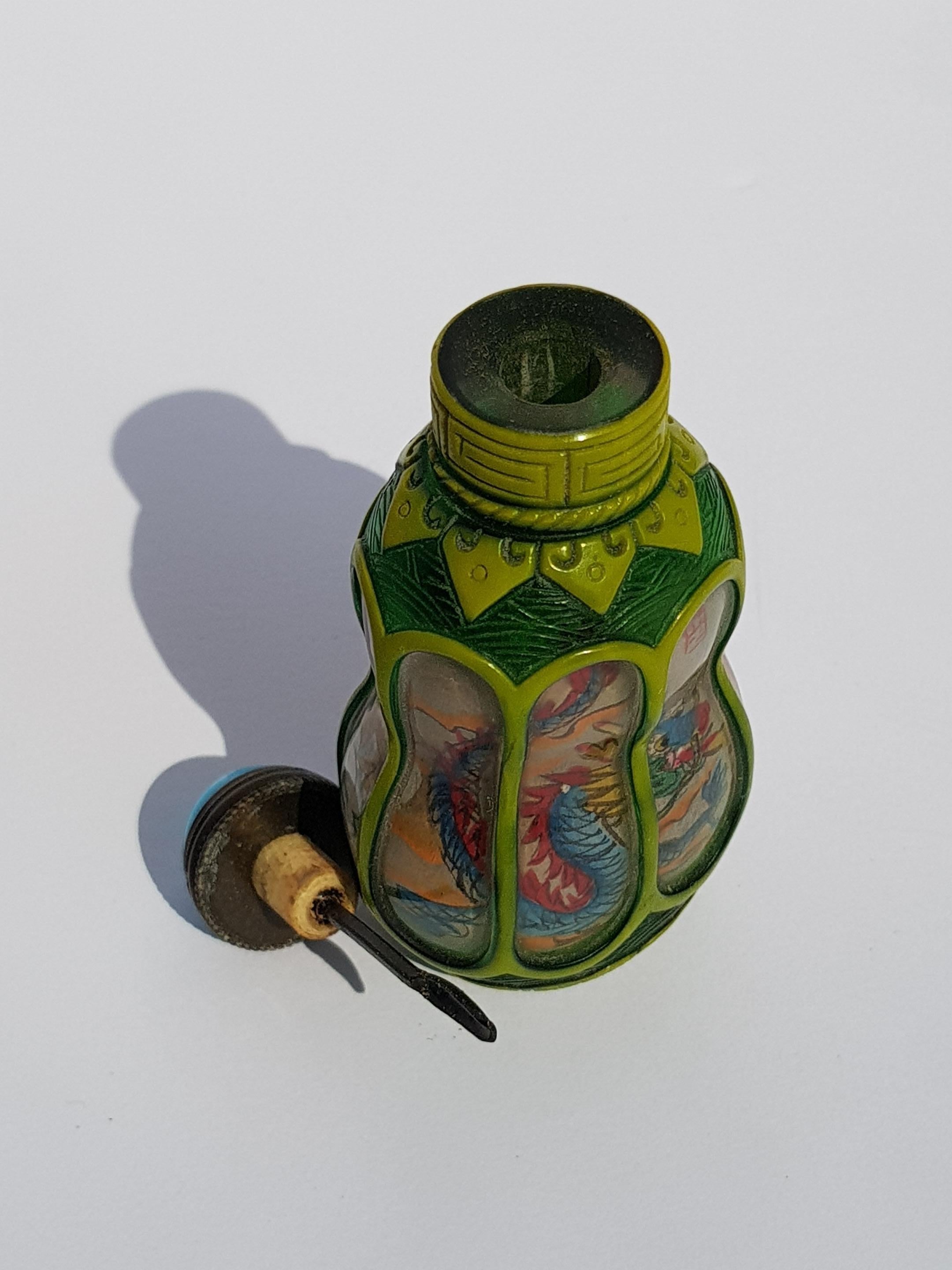 Chinese Hand Carved Peking Glass Snuff Bottle Reverse Painted Dragon Pearl Gourd For Sale 4