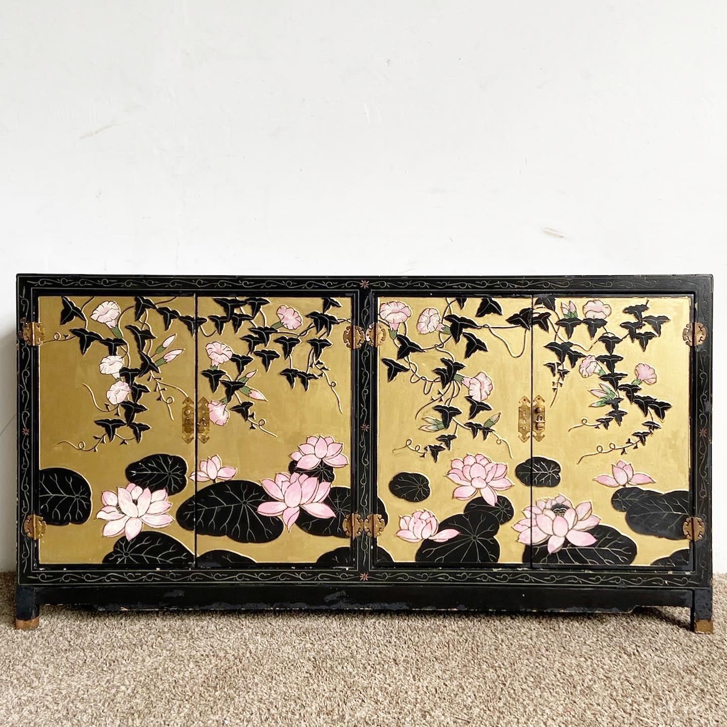 Experience opulence with this Chinese Hand Painted and Carved Black and Gold Credenza. A luxurious blend of meticulous craftsmanship and rich detailing.
Some wear and chips as seen in the photos. Hinges have been repaired and are still faulty.