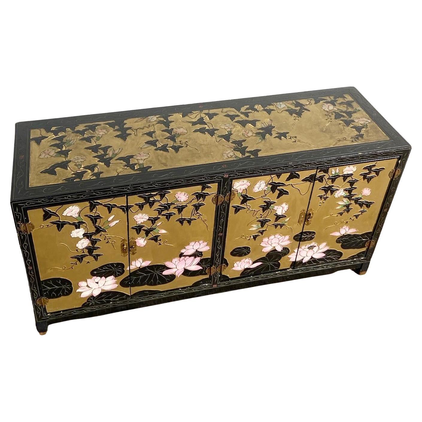 Chinese Hand Painted and Carved Black and Gold Credenza For Sale