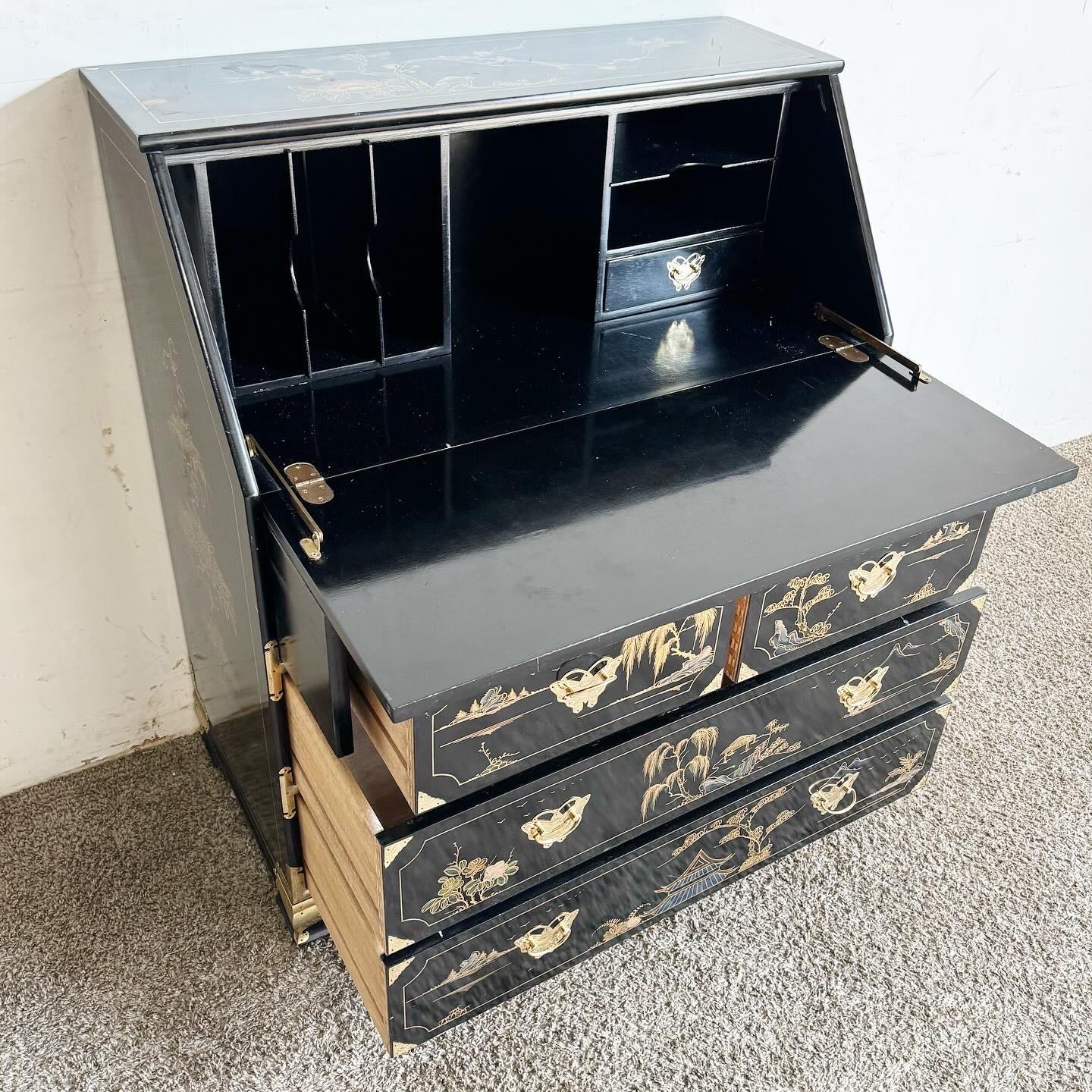 Immerse yourself in the beauty of traditional Chinese craftsmanship with this Hand Painted/Black Lacquered and Brass Secretary Desk. Featuring intricate hand-painted scenes on a rich black lacquer finish, complemented by brass accents, this desk is