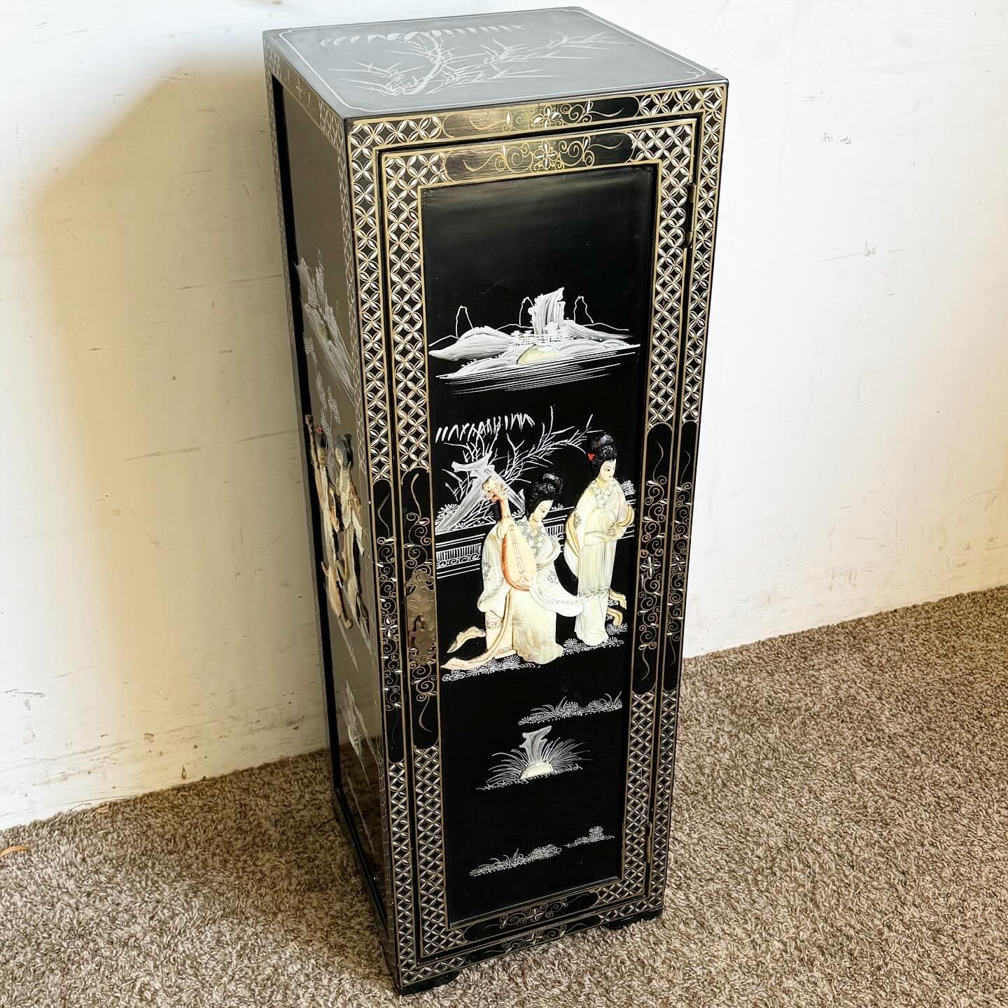 Experience the traditional elegance of this Chinese Hand Painted Black Pedestal Cabinet, a testament to exquisite craftsmanship and artistry. Adorned with detailed motifs and cultural scenes in a rich black hue, this piece combines the beauty of