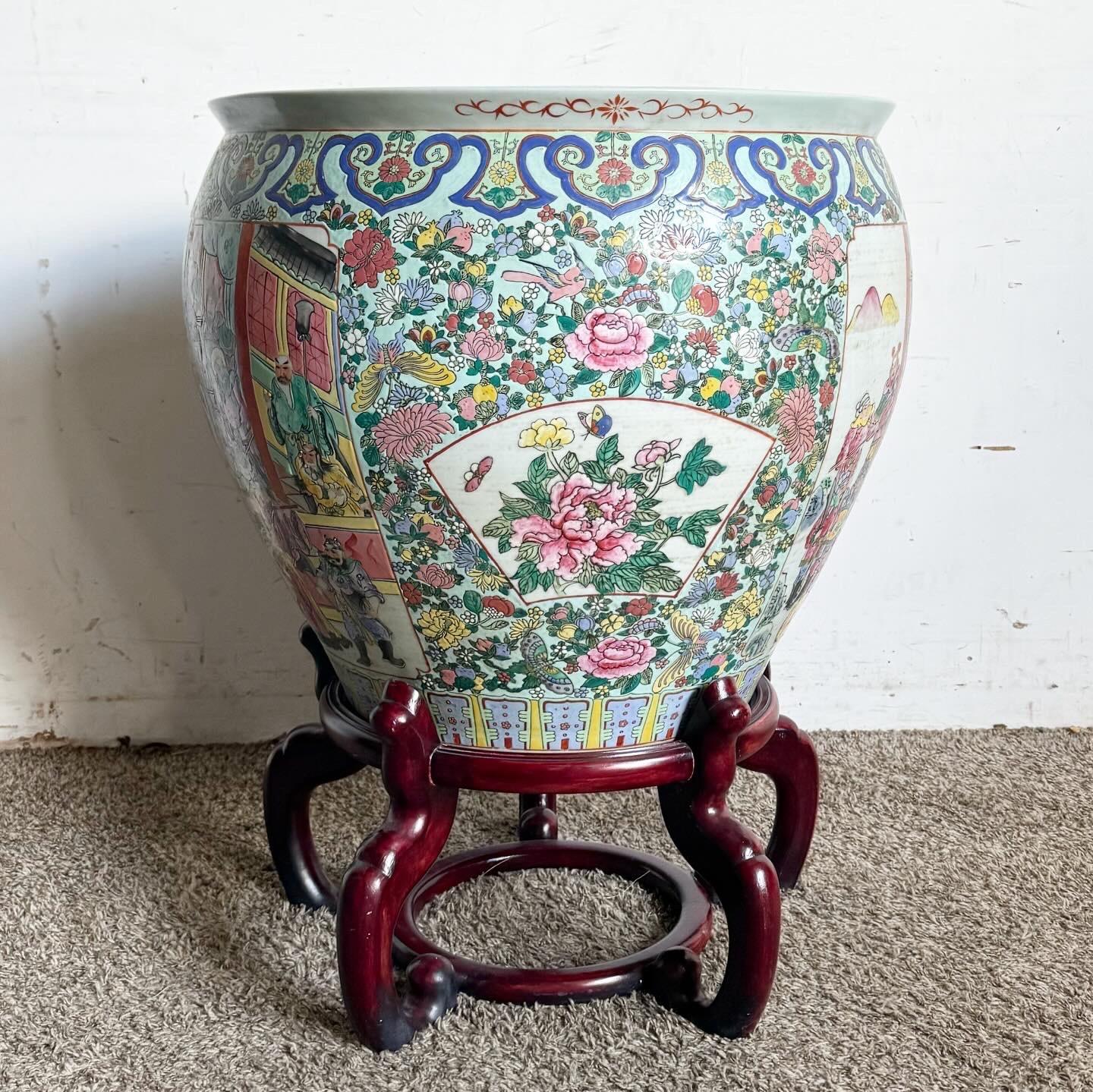 Elevate your decor with this Chinese Hand-Painted Floor Vase on a Wooden Stand. This vase showcases intricate hand-painted motifs that reflect traditional Chinese artistry. The vibrant colors and patterns enhance any space, providing a blend of