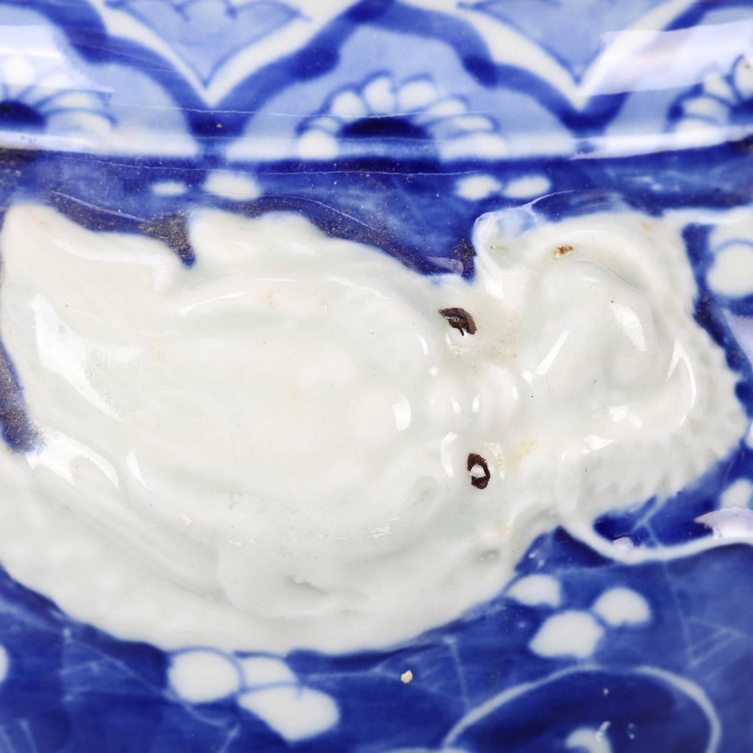 20th Century Chinese Hand-Painted High Relief Porcelain Dragon Jardeniere, Blue and White