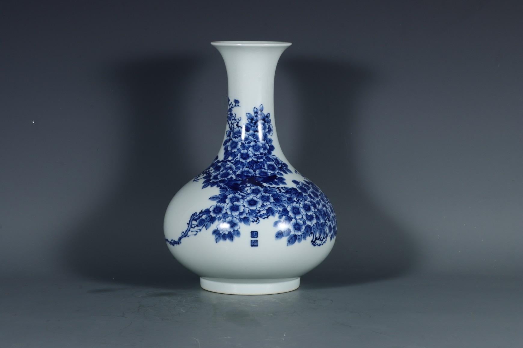 The Chinese hand-painted porcelain blue and white vase featuring birds and flowers is a classic example of traditional Chinese ceramic art. Blue and white porcelain has a long and esteemed history in China, dating back to the Yuan Dynasty