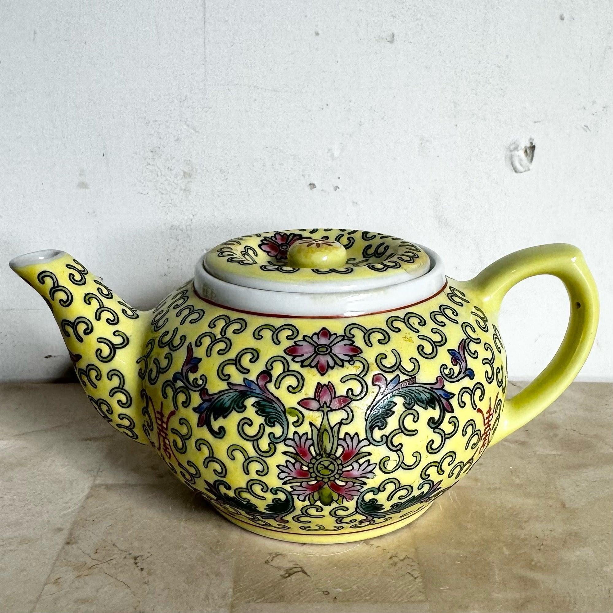 Mid-20th-century Chinese hand-painted yellow floral porcelain teapot, combining traditional craftsmanship with decorative charm.
 
 We sell items as acquired, without restoring or repairing. Vintage pieces may have age-related wear. Review photos