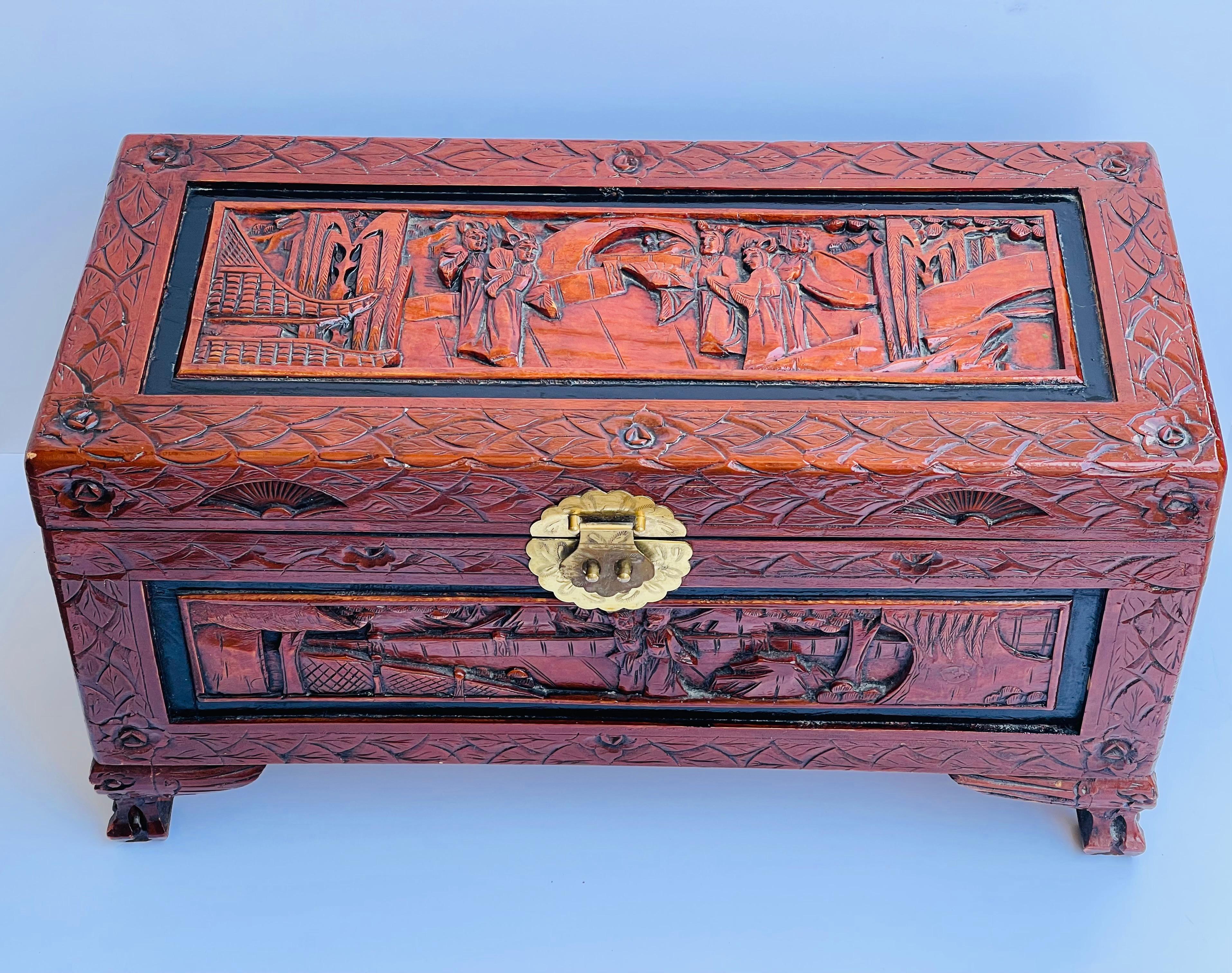 Chinese antique handcarved wood trunk or chest with great reddish patina and brass hardware. Great condition.