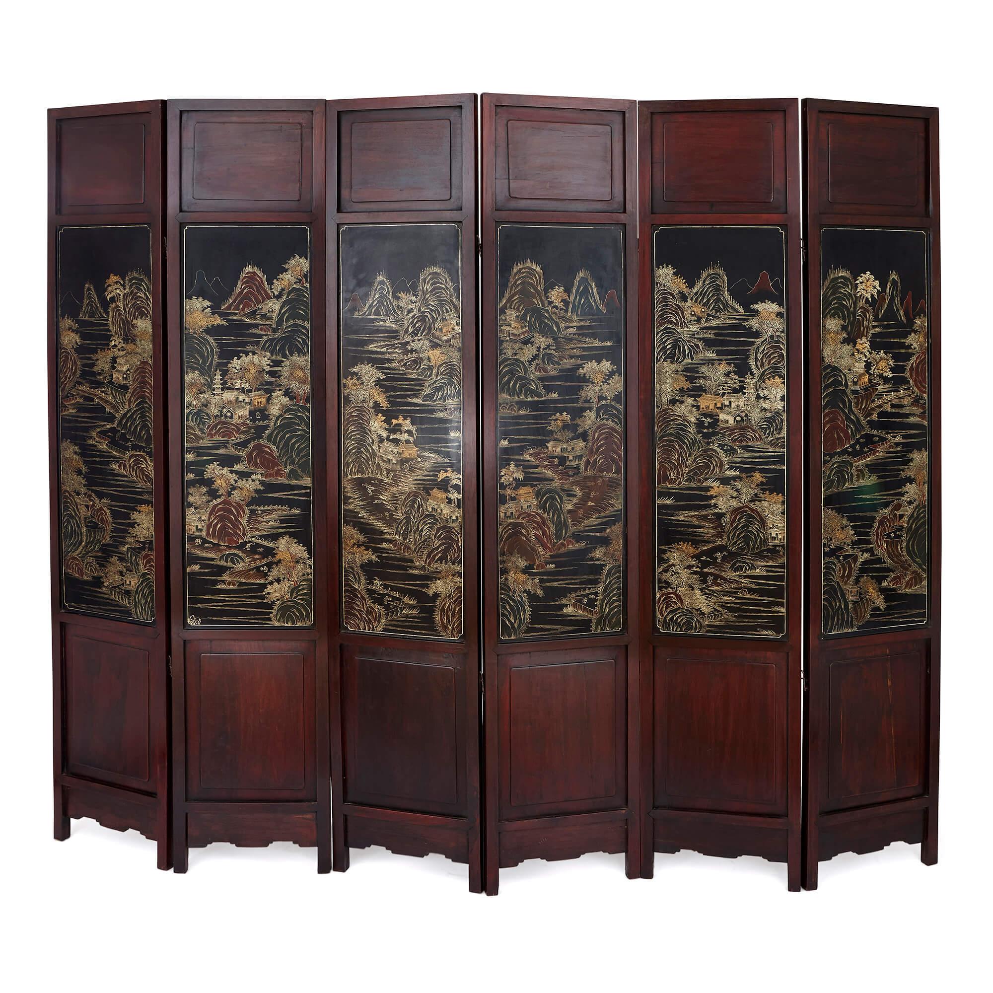Dedicated craftsmanship in traditional techniques, combined with refined simplicity in design, makes this antique Chinese screen a truly special piece. Built from hardwood and decorated with lacquer, hardstones, enamels, and paint, the screen is a