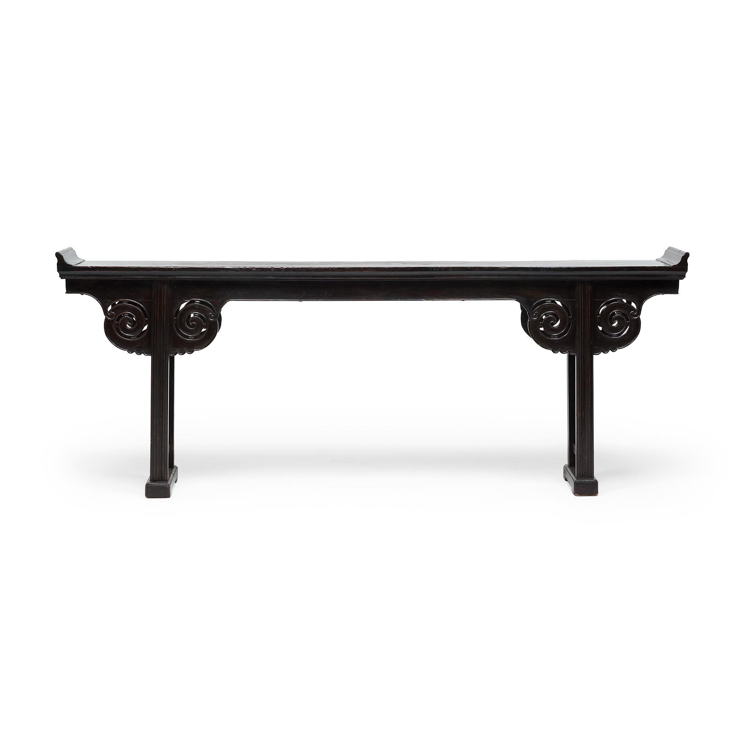 This elegant console table was expertly crafted over 150 years ago and likely served as a family’s home altar where they paid their respects to revered ancestors. The top is comprised of a solid plank of hardwood decorated with a finely beaded trim