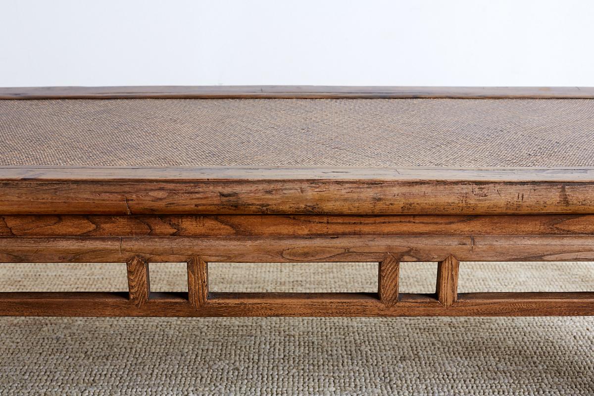 Chinese Hardwood Bench Coffee Table with Raffia Seat In Distressed Condition In Rio Vista, CA
