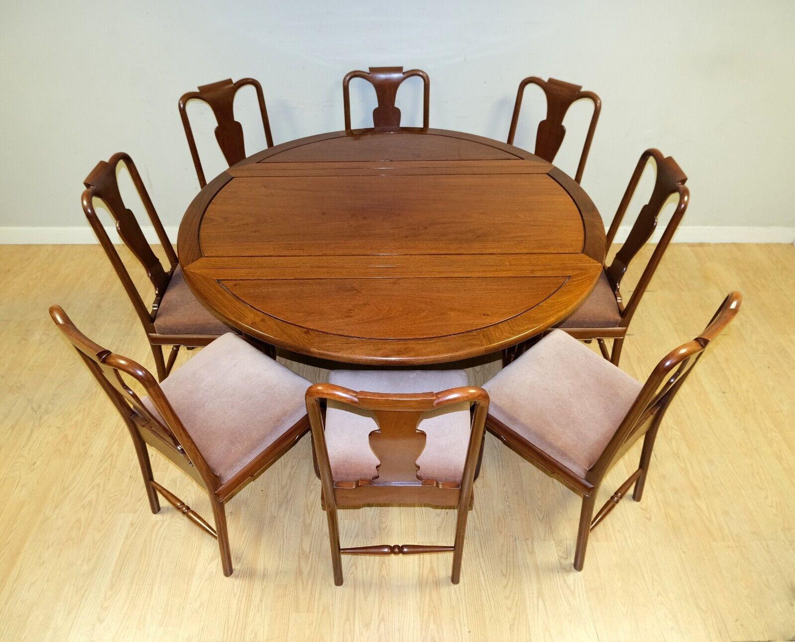 20th Century Chinese Hardwood Drop Leaf Dining Table Claw & Ball Feet Set of Eight Chairs