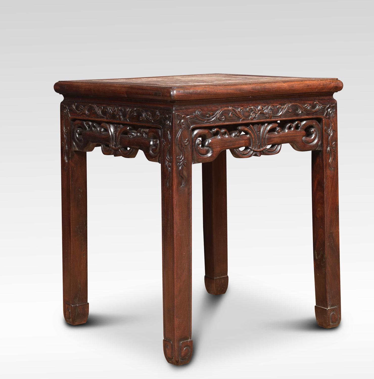Chinese hardwood occasional table of square section, with inset red marble top, over a carved freeze, on shaped stylized supports
Dimensions:
Height 20.5 inches
Width 17 inches
Depth 17 inches.