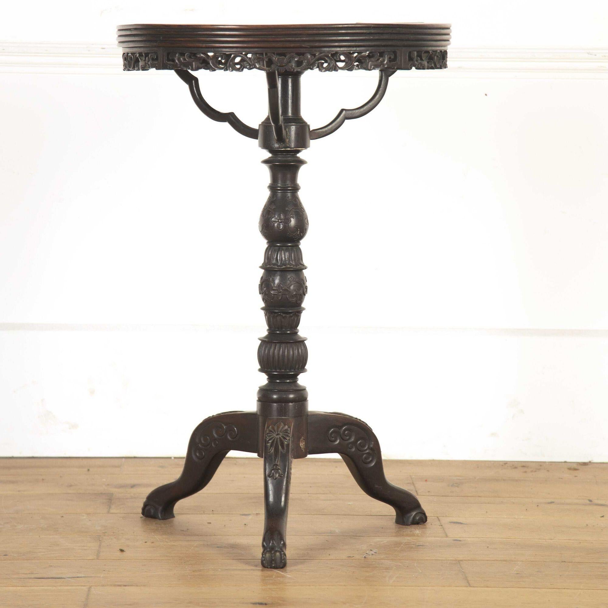 Late 19th century Chinese export hardwood table with inset marble top.