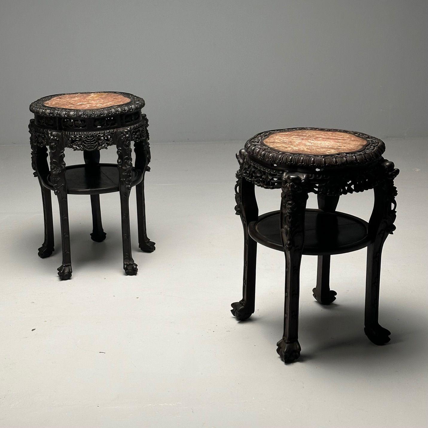 Chinese Heavily Carved, Occasional Tables, End Tables Teak, Marble, 1920s

Compatible pair of heavily carved large occasional tables or pedestals designed and produced in China in the late 19th early 20th century. Each finely carved base supporting