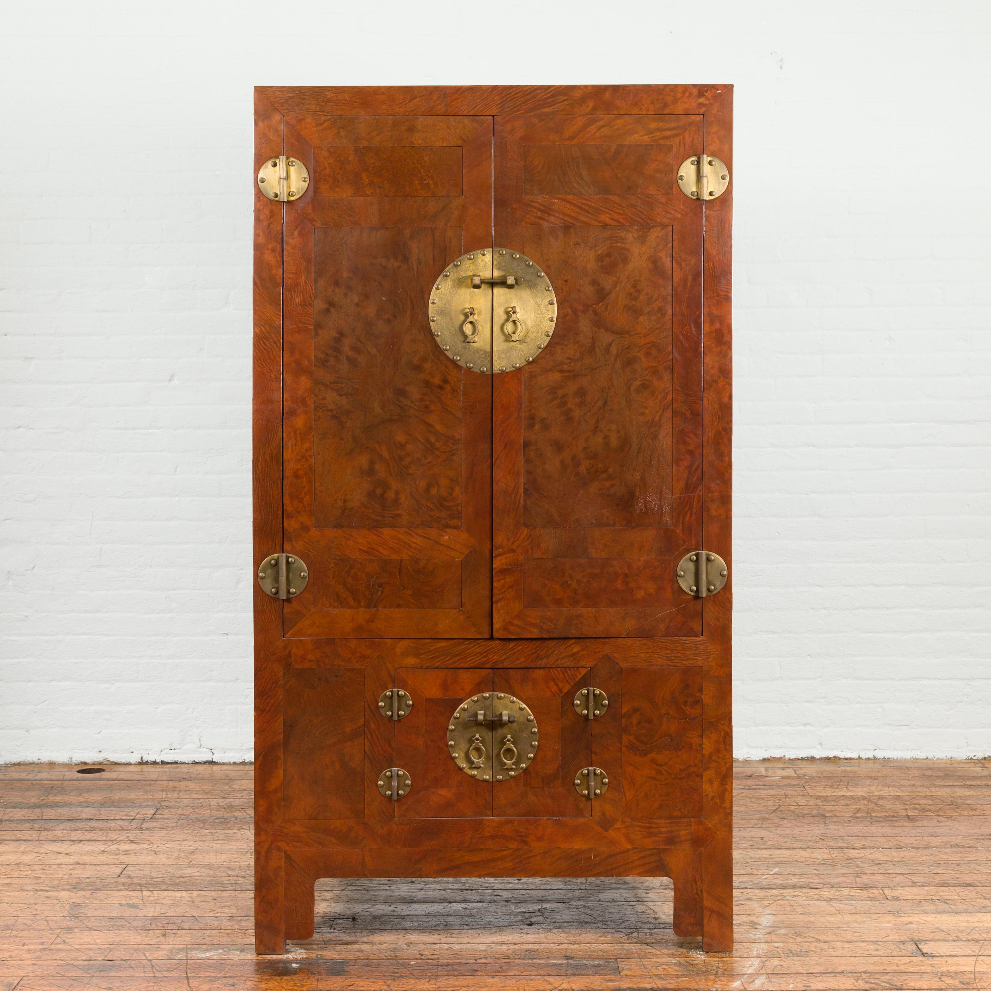 A Chinese early 20th century antique burl wood cabinet from Hebei, with medallion brass hardware. Created in the Northeastern province of Hebei during the early years of the 20th century, this cabinet features a linear silhouette perfectly