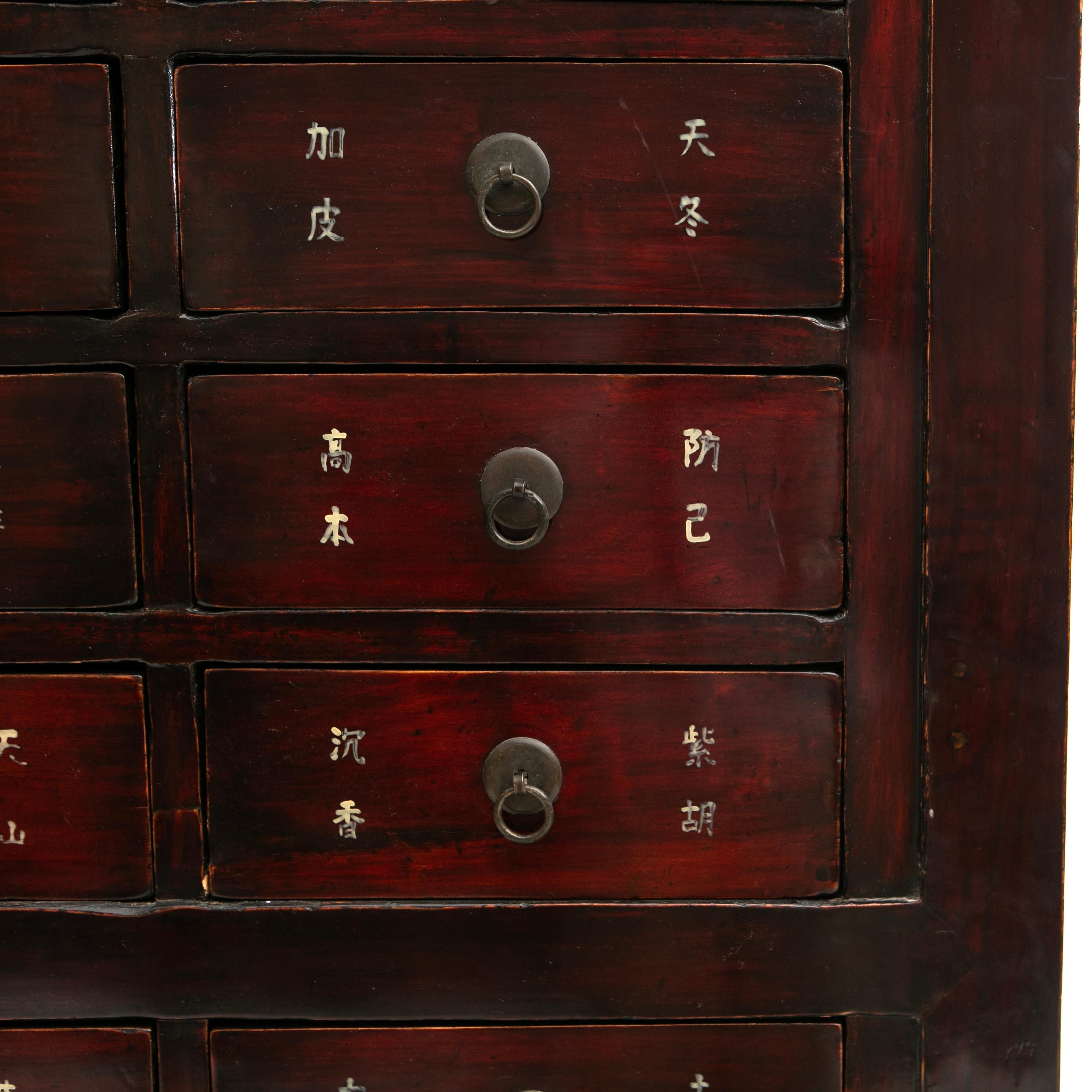 Lacquered Chinese Burgundy Brown Herbal Apothecary Chest, Late 19th Century For Sale