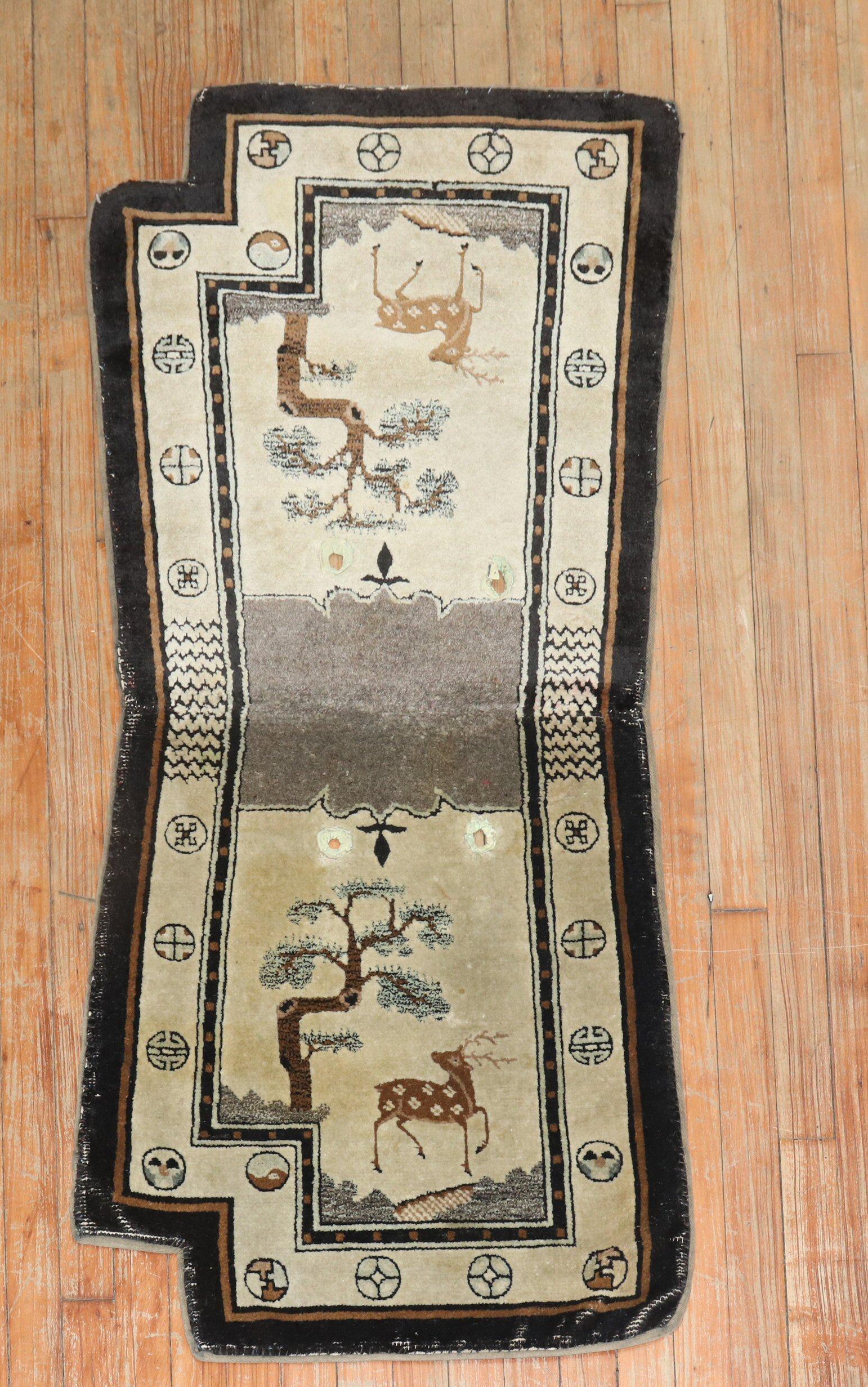 An early 20th-century colorful Tibetan horse cover textile rug.

Measures: 2'1'' x 4'7''.