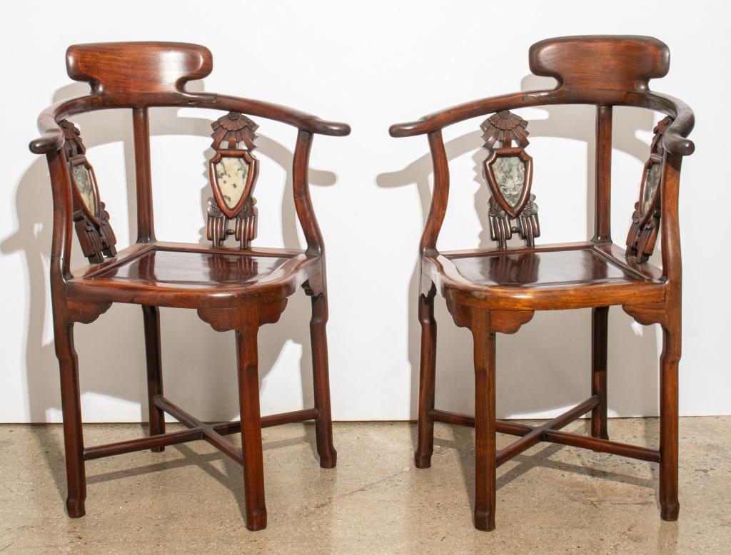 Pair of Chinese Huanghuali and Dream Stone Marble Inset Corner Chairs, circa 19th century or earlier, with shield-form backs. 34.25