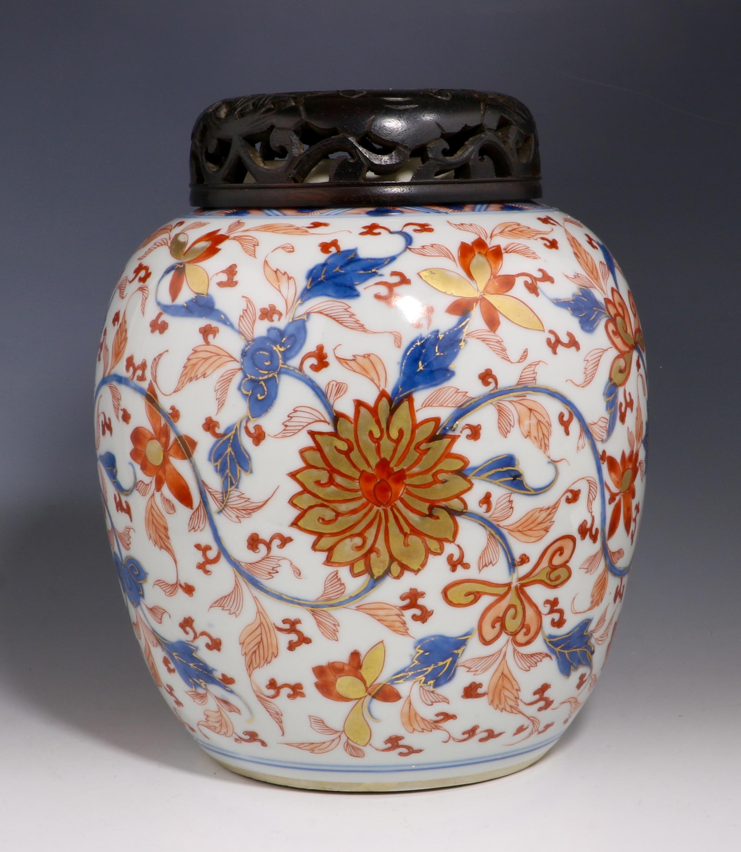 A Chinese Imari ginger jar. Well decorated in typical iron red, underglaze blue and gilt palette with a continuous Lotus scroll.

 