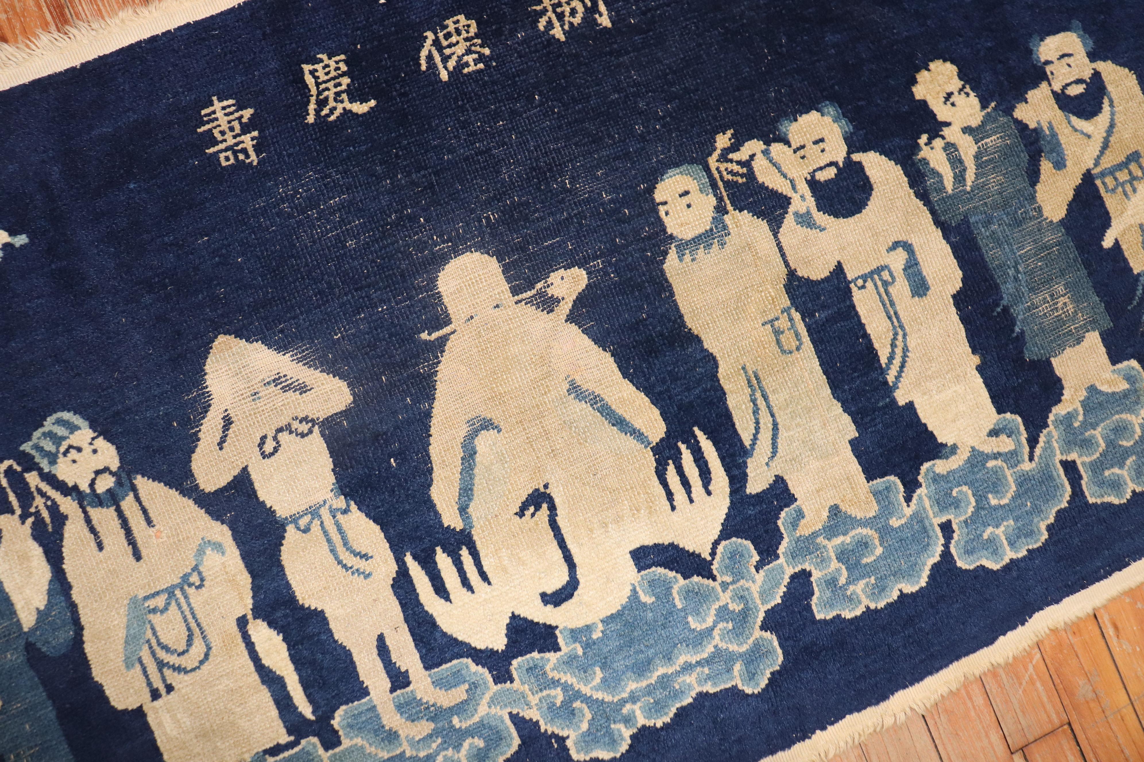 An early 20th century Chinese Buddha Discipile rug

Measures: 2'4'' x 6'.