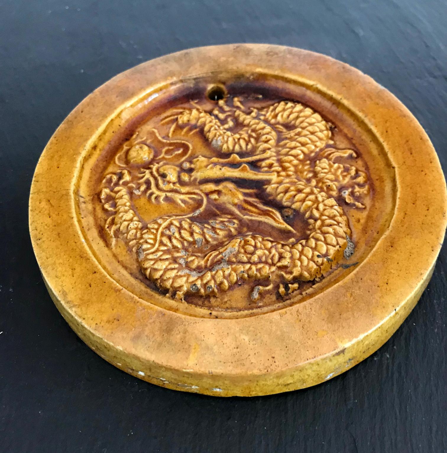 A piece of very interesting Chinese imperial architectural history found in an old estate in the States, on offer is a roundel roof tile for an imperial building, conventionally fitted as a decorative piece on the end of the vertical tile tubes