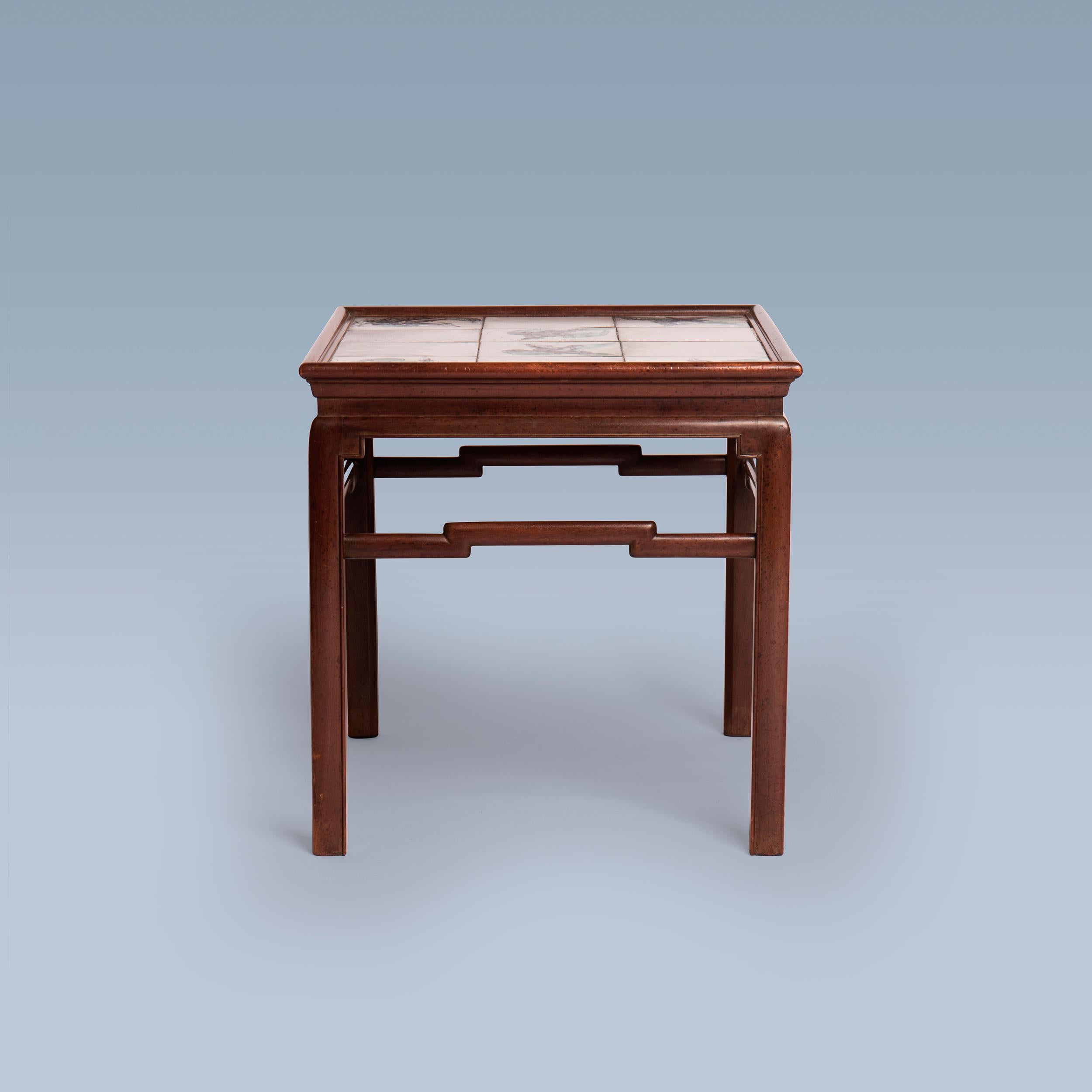 Mid-20th Century Chinese inspired mahogany coffee table with tiles in white, green, blue nuances For Sale