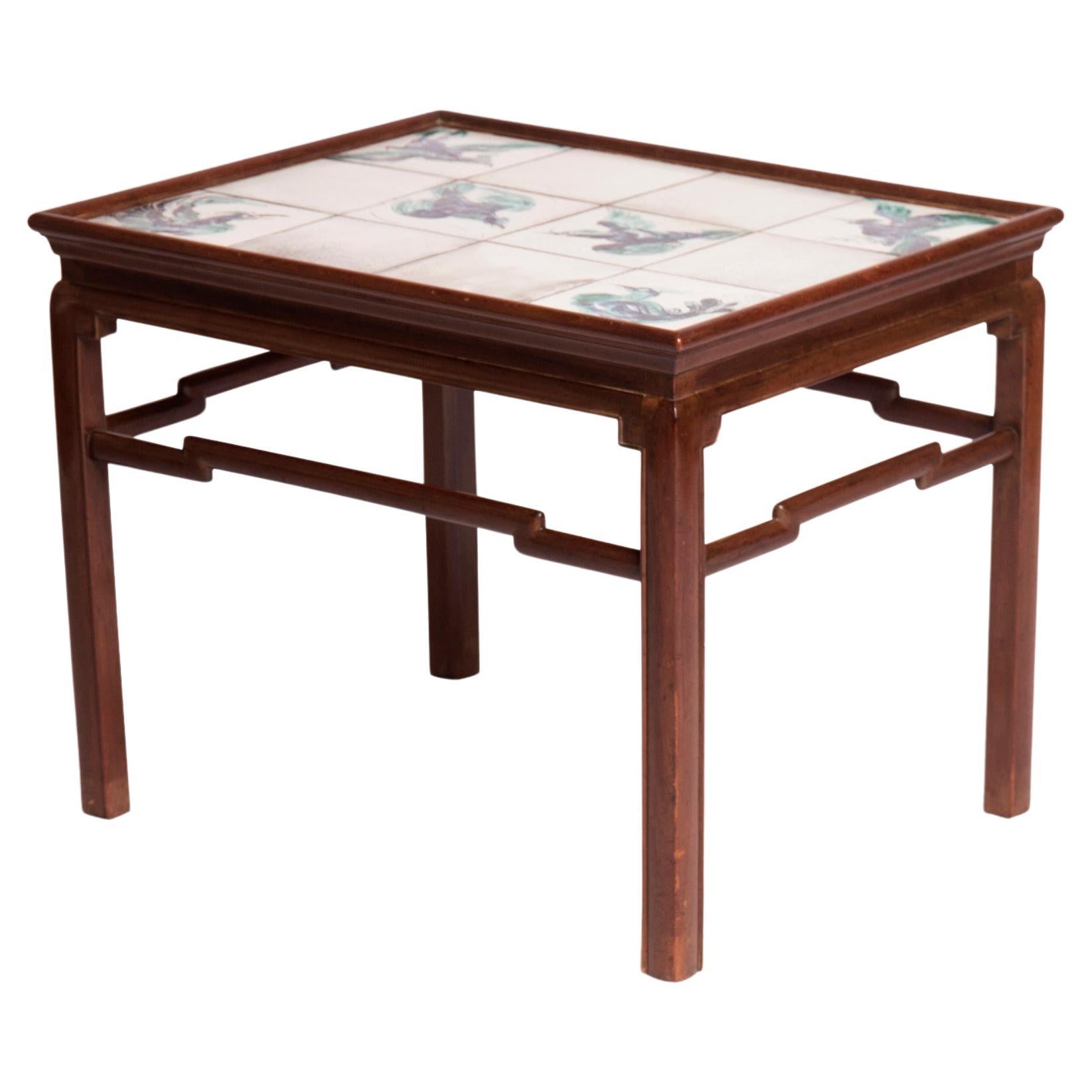 Chinese inspired mahogany coffee table with tiles in white, green, blue nuances For Sale