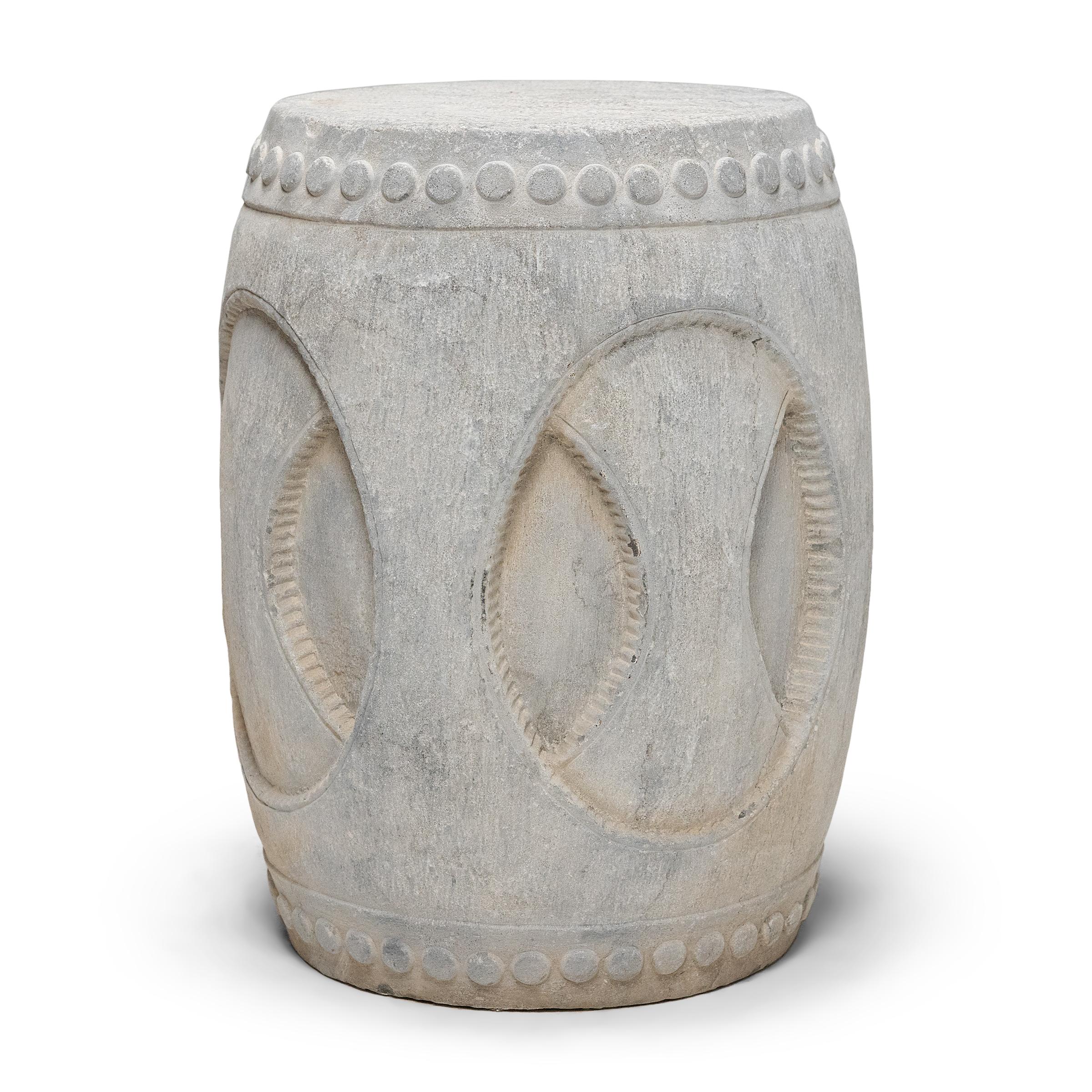 Drum-form stools such as this were traditionally used in gardens and outdoor pavilions where upper class scholars read, wrote, gathered for discussion and, in general, developed their inner sensibilities. This contemporary example was carved from a