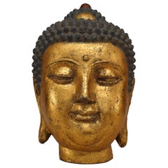 Busto di Buddha cinese in ferro e dorato