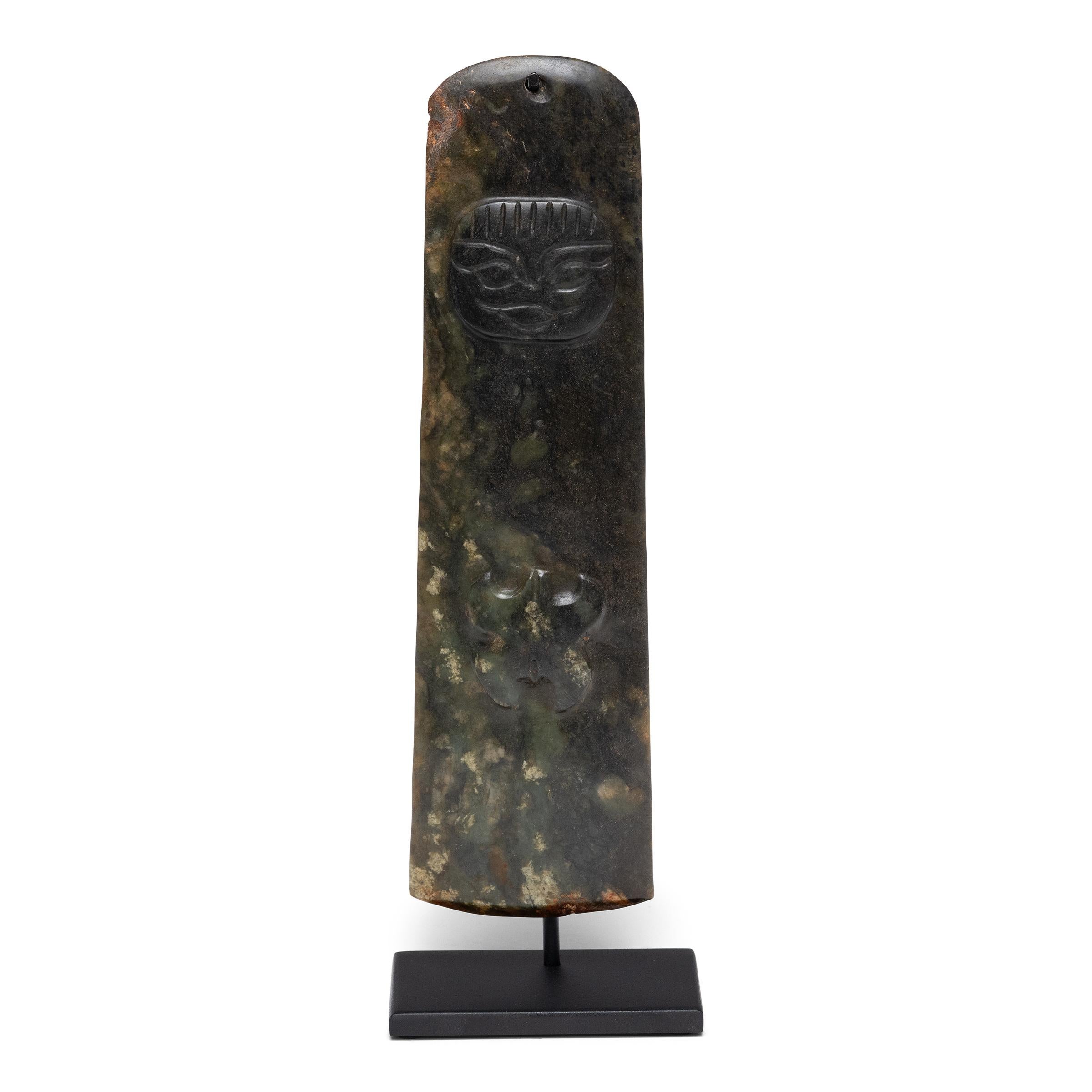 Based on forms that emerged during the Shang Dynasty (1600-1027 BC), this jade stone ceremonial blade continues upon this tradition with precision. The Shang dynasty placed great emphasis on the administration of power through ceremonies that