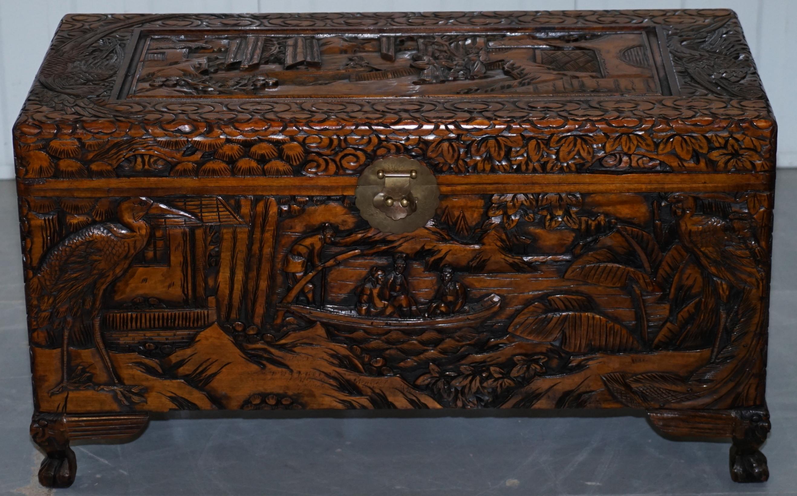 We are delighted to offer for sale this vintage Chinese or Japanese Export carved wood trunk with claw and ball feet

A good looking piece depicting rural scenes, the lock plate it hand hammered and engraved, the feet are claw and ball which I’ve