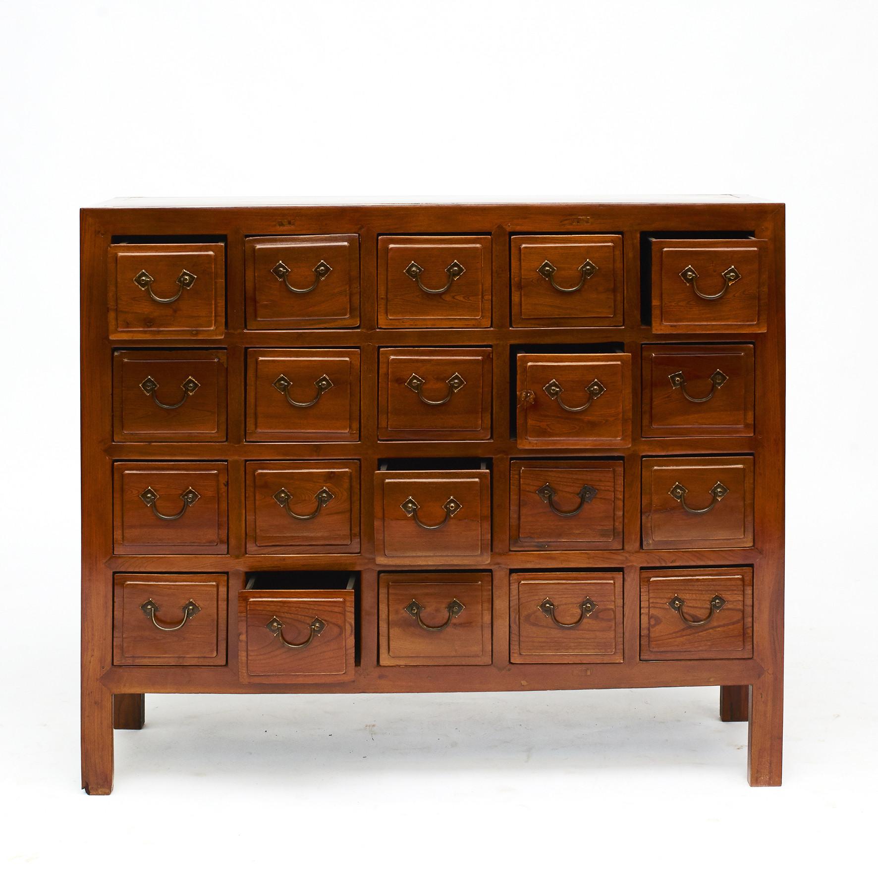 Chinese elm apothecary / pharmacy medicine chest with 20 drawers.
Made in Jumu wood, also called 