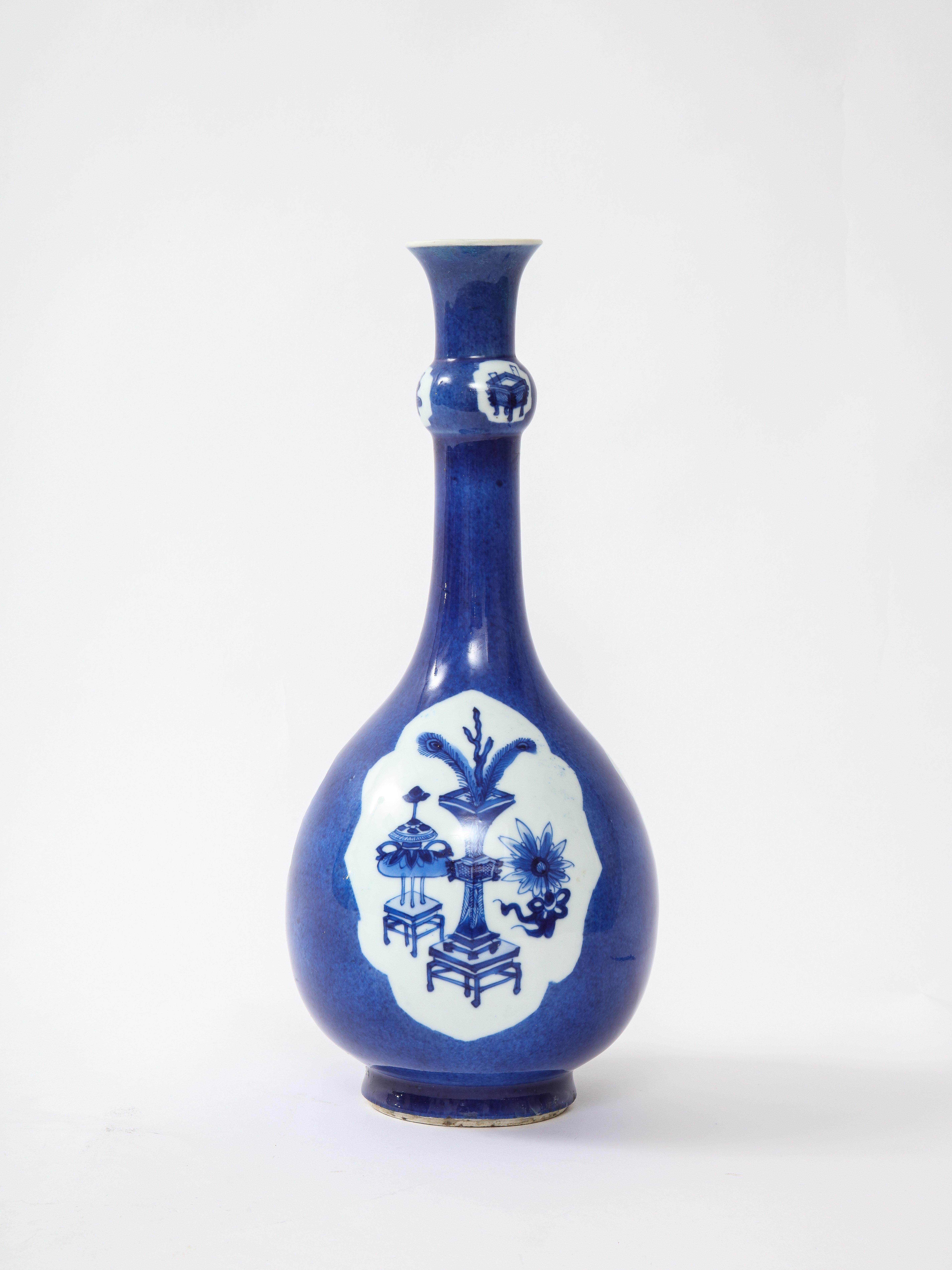A large, rare, and beautiful Kangxi Period blue and white porcelain pear form and garlic neck vase, From the Collection of the 31st President of the United States, Herbert Hoover. Of pear form with a bulbous garlic neck, this Kangxi era porcelain