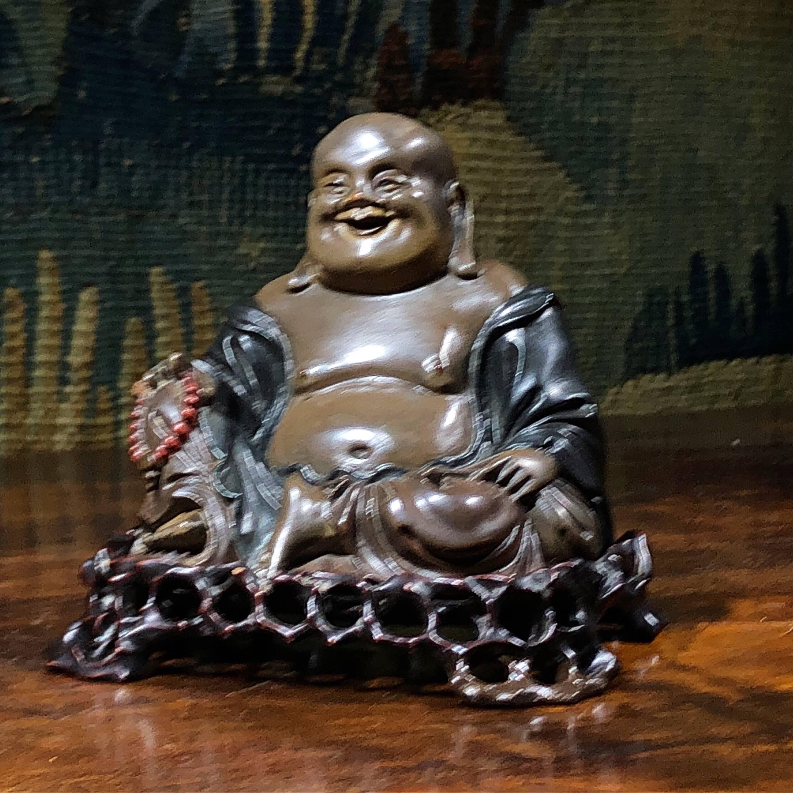 Superb quality Chinese lacquer Buddha, modelled in toned lacquer over finely carved wood, sitting with red beads and bag in hand, on original rustic stand.
References: Foochow (Fuzhou) is one of the five Chinese treaty ports, the capital of Fujian