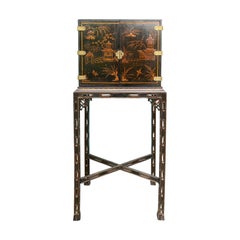 Chinese Lacquered Cabinet on Finely Carved Fretwork Stand, circa 1860-1880