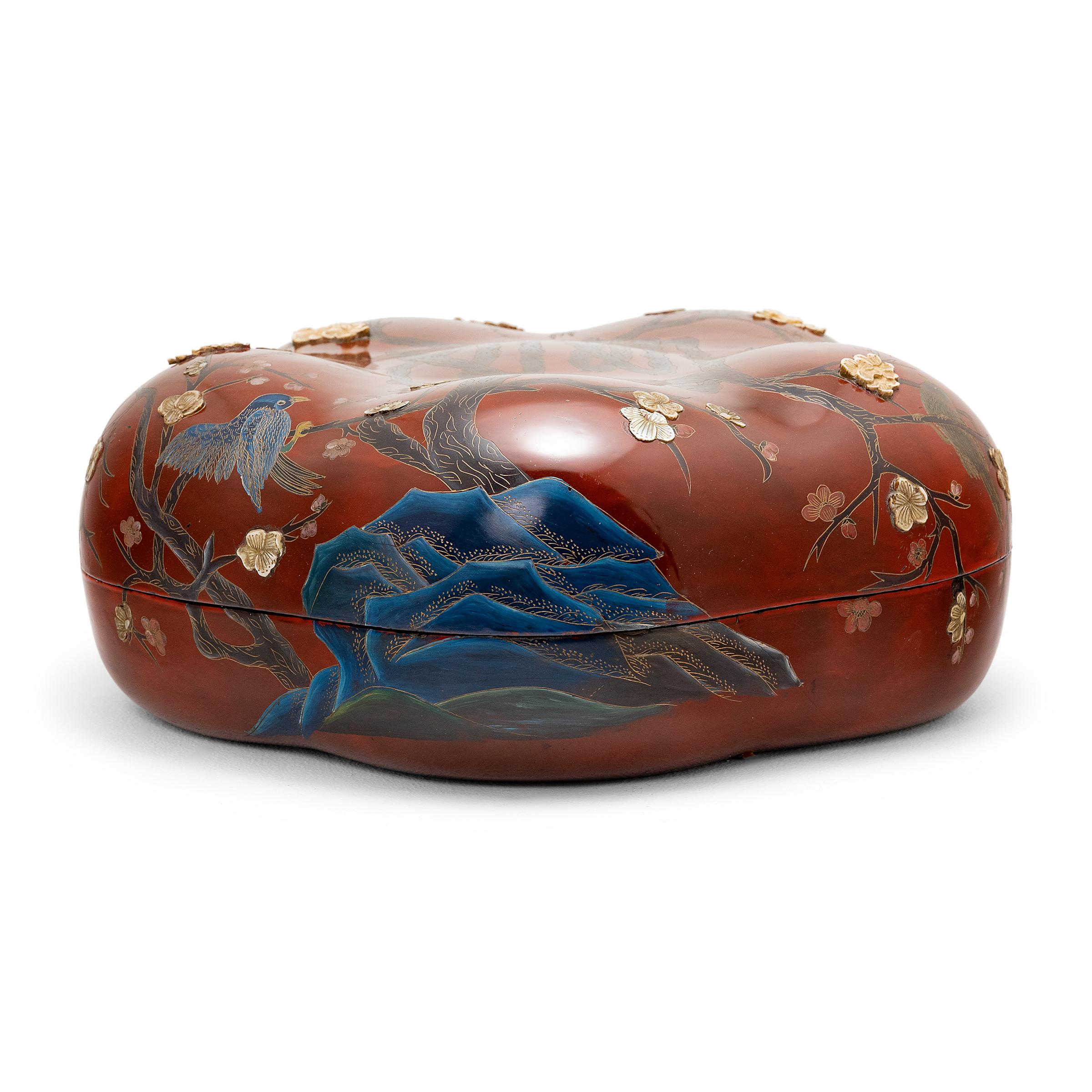 This finely lacquered box was once presented as a gift, filled with popular snacks like roasted melon seeds, dried fruit, and cinnamon-toasted soy beans. Dated to the late 19th century, the lightweight box is formed of wood and lacquer in the shape