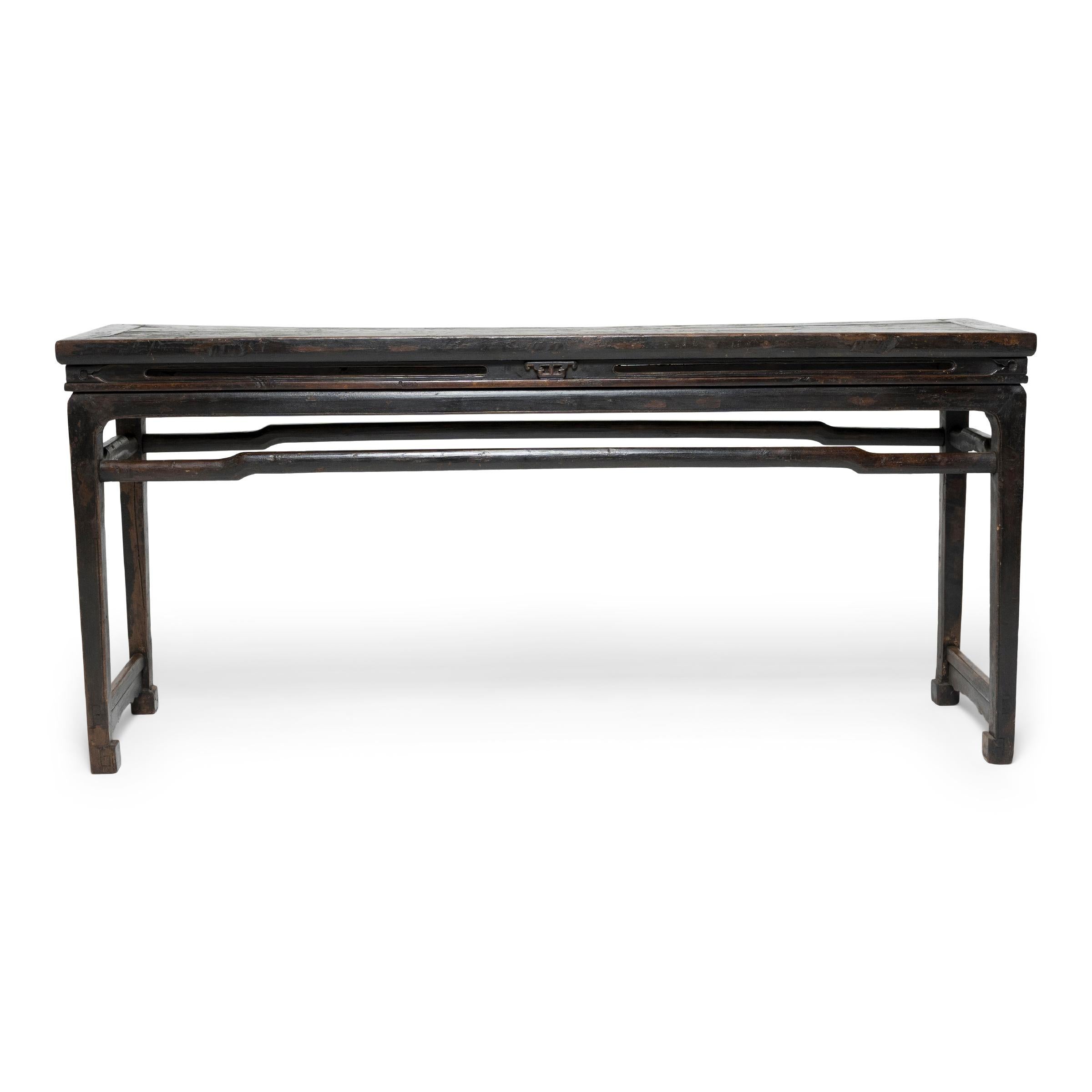 Perfected in the Ming dynasty, complex joinery techniques allowed craftsmen to create furniture with flowing lines, a sense of lightness, and remarkable durability. Crafted using traditional methods, this 19th-century offering table is a beautiful