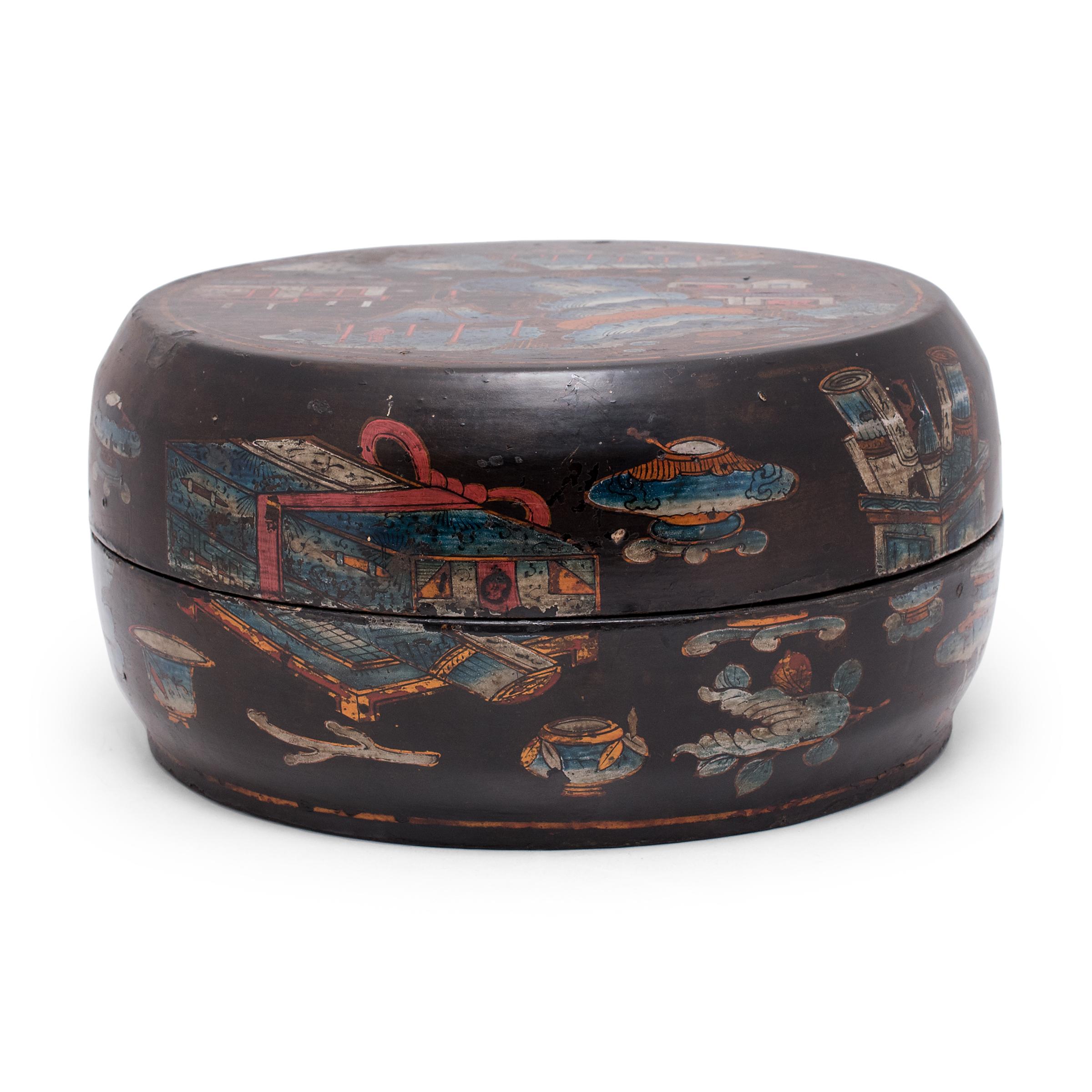This round lacquered box dates to the mid-19th century and would have been presented to another as a gift, filled with foods, clothes, or other ceremonial gifts. Remarkably, the two halves of this box are not a match and were likely combined from