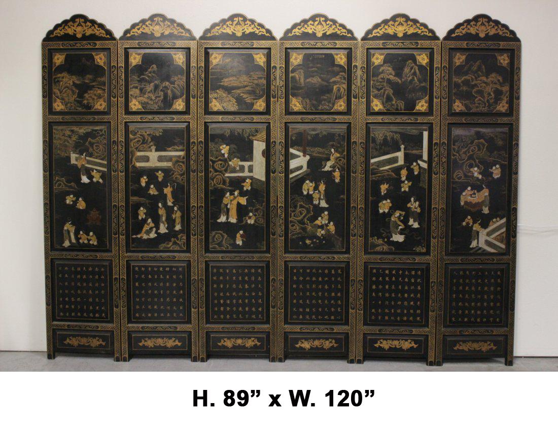 Impressive Chinese lacquered and parcel gilt six panel screen. 
Mid 20th century
Each lacquered and parcel gilt decorated panel is separated into four smaller panels, the top panel presents with various landscape scenes, the largest panel depicts