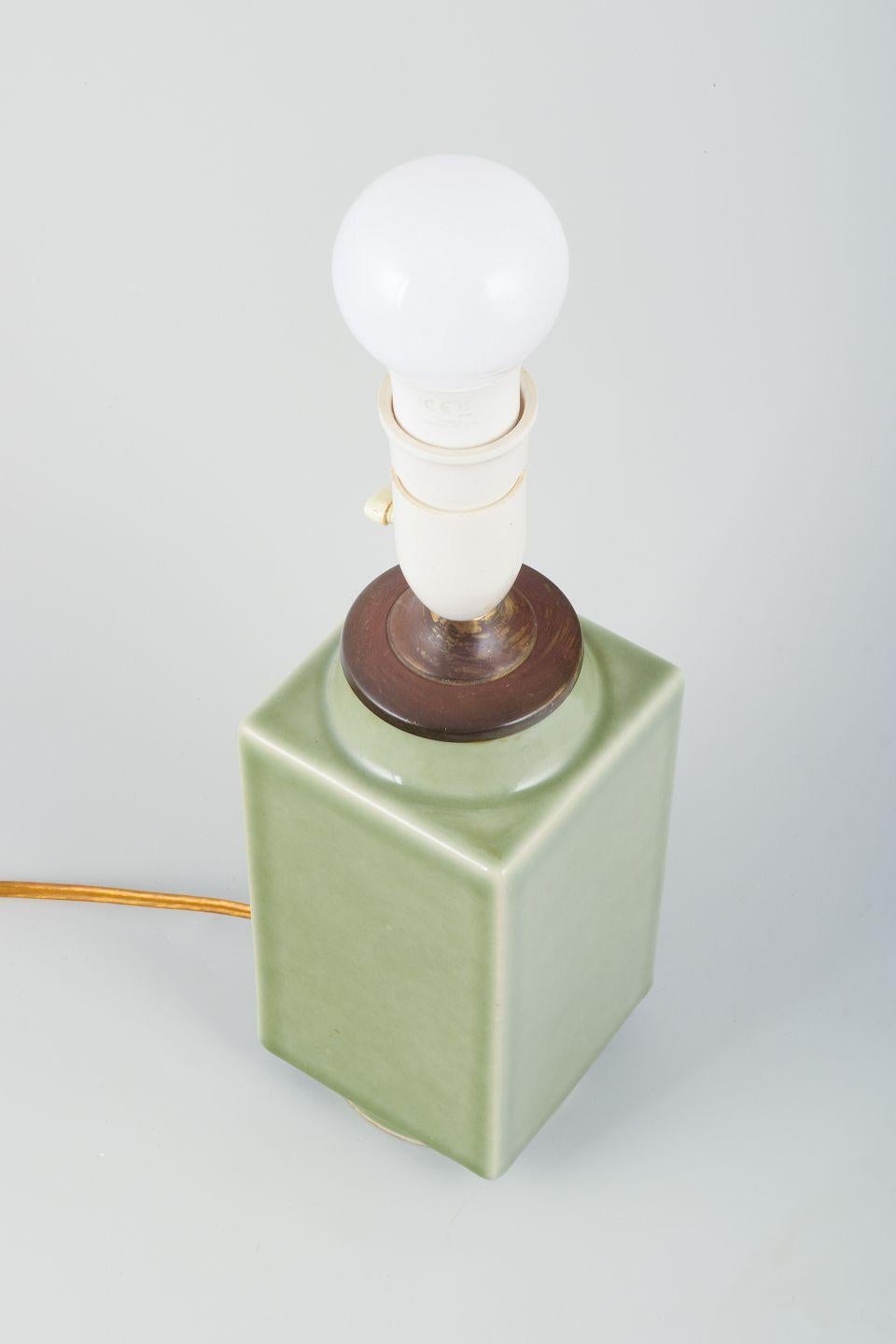 PRE-OWNED GOODS ARE EXEMPT FROM IMPORT TARIFFS FOR U.S., UK, AUSTRALIAN & CANADIAN CUSTOMERS.   
THEREFORE, NO IMPORT TARIFFS WILL BE APPLICABLE TO YOUR PURCHASE. 

Chinese lamp in ceramic with brass fitting.
Celadon glaze.
20th