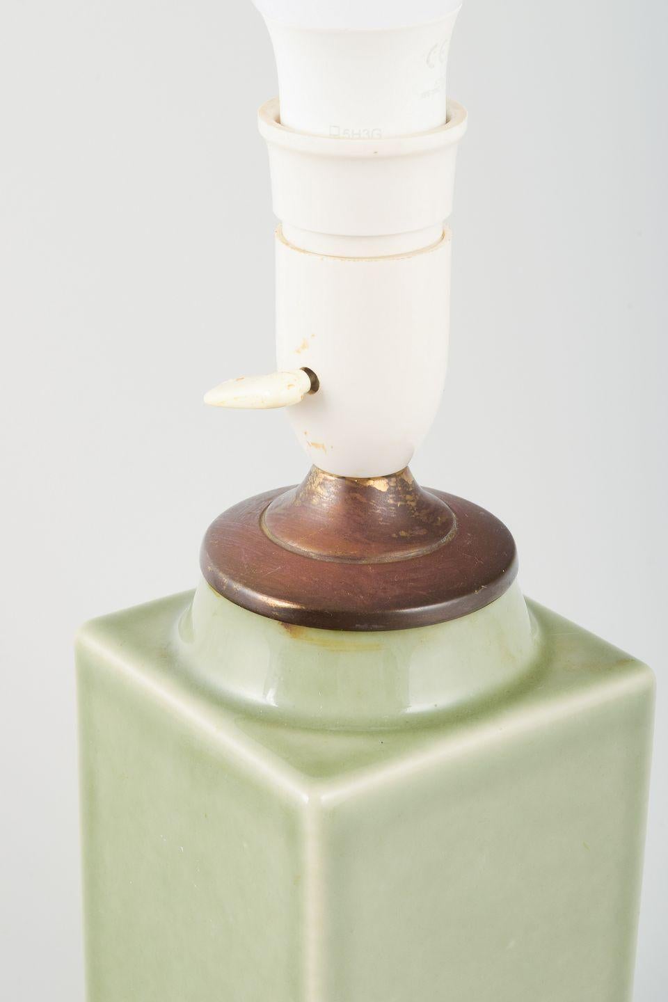 Chinese lamp in ceramic with brass fitting. Celadon glaze. 20th century. In Excellent Condition For Sale In København, Copenhagen