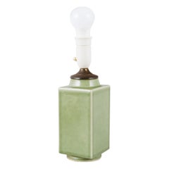 Chinese lamp in ceramic with brass fitting. Celadon glaze. 20th century. Chinese lamp in ceramic with brass fitting. Celadon glaze. 20th century.