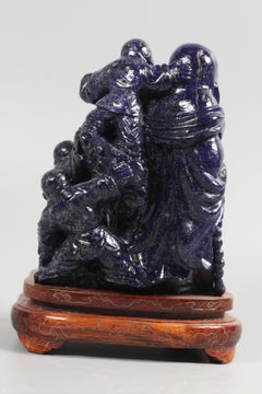 Chinese lapis carving of Hotei Buddha with Children