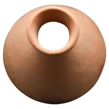 A majestic large terracotta jar with impressed decorations to the mid to lower body, a slightly flaring neck with globular body. Impressed decoration also to the top of the neck below the rim. 
This piece has been precisely dated by means of a