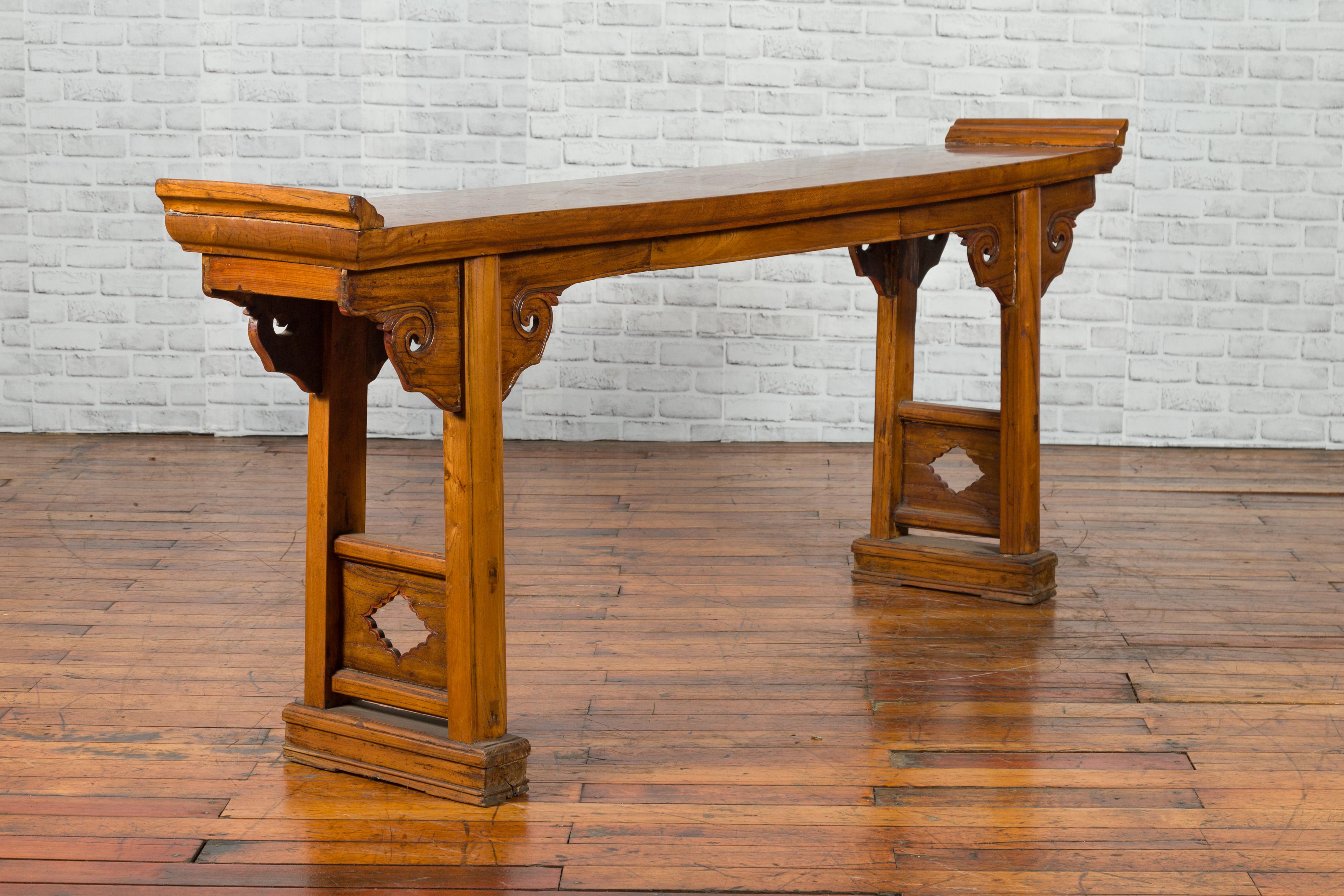 Carved Chinese Late 19th Century Qing Elm Altar Console Table with Cloud Spandrels