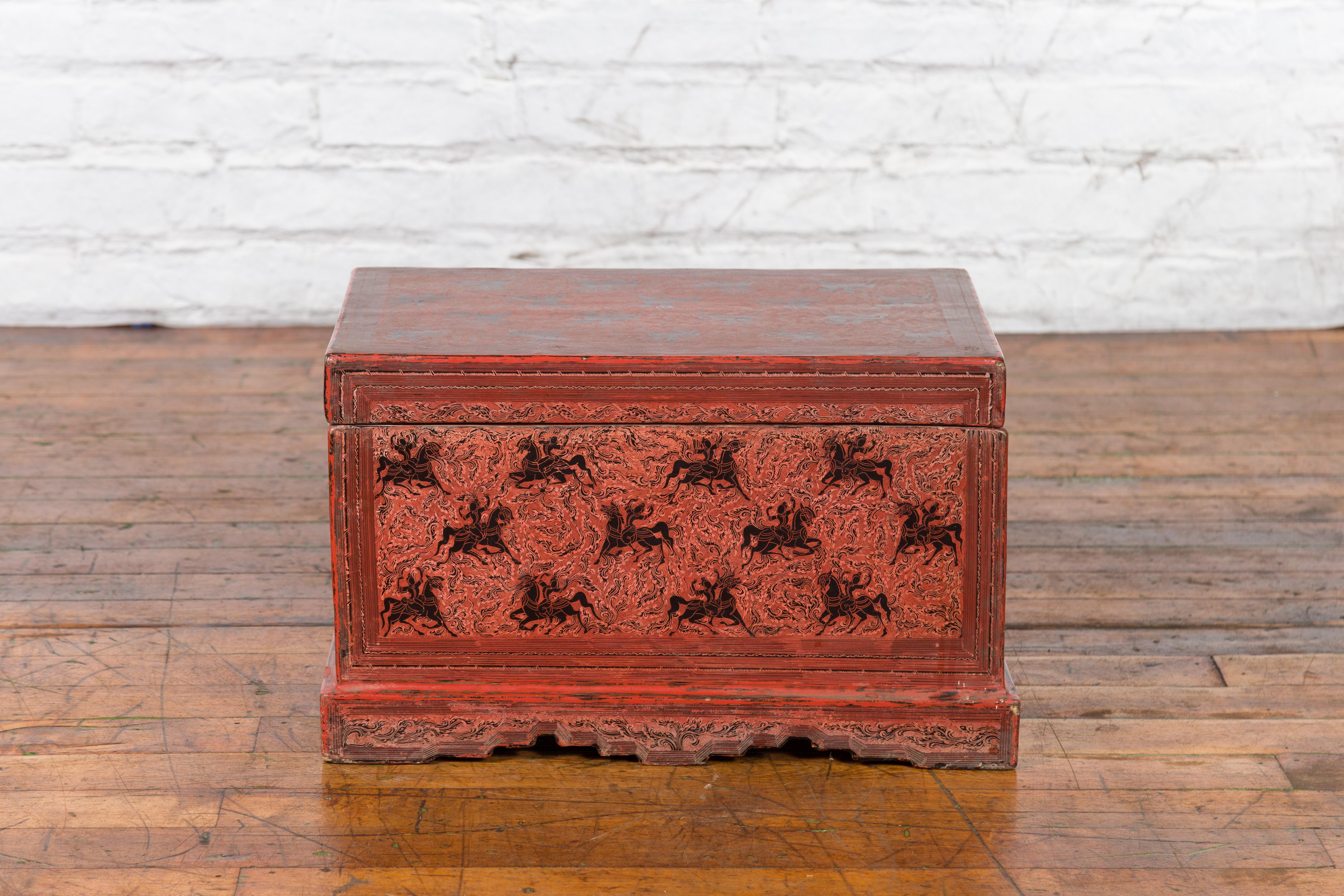 Carved Chinese Late 19th Century Red Trunk with Black Hand-Painted Riders on Horses For Sale