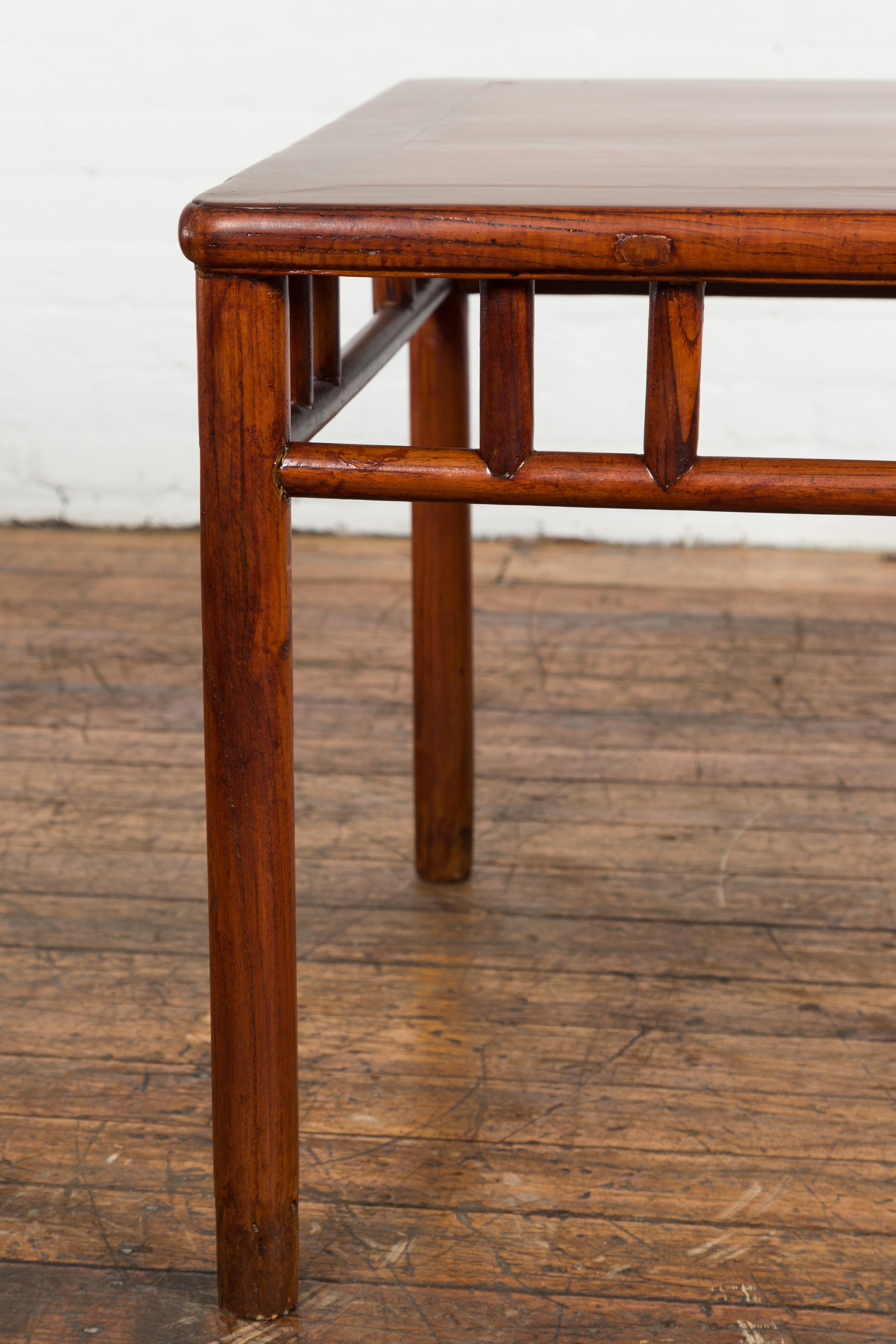 20th Century Late Qing Dynasty 1900s Table with Open Apron and Pillar Strut Motifs For Sale