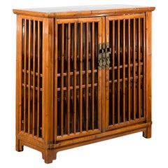 Chinese Late Qing Dynasty Early 20th Century Elm Side Cabinet with Slatted Doors